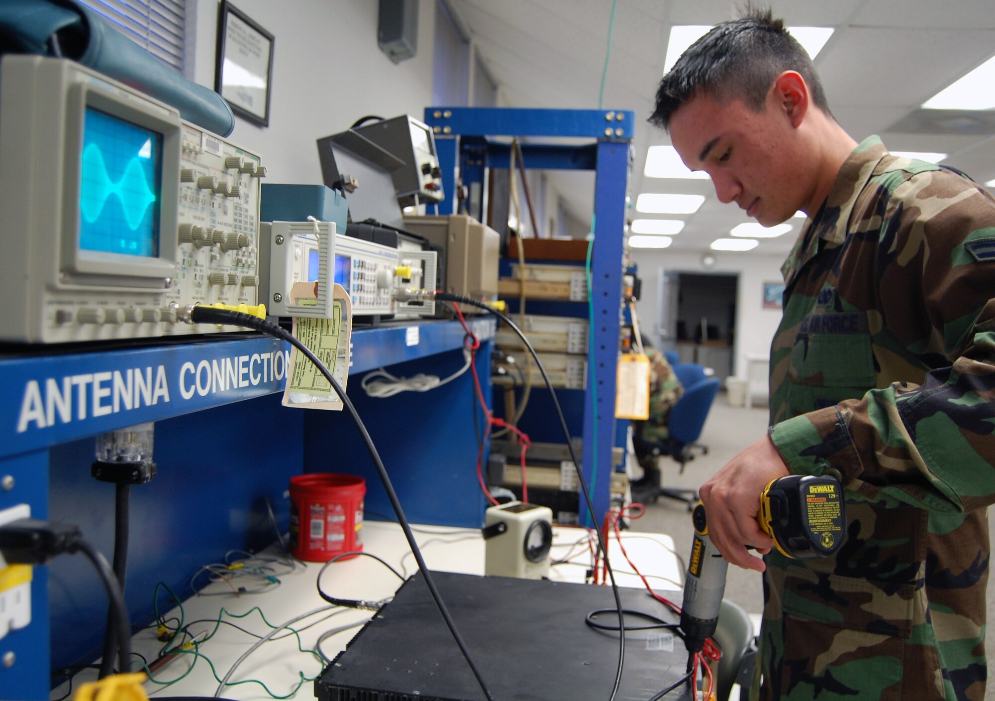 LAUGHLIN AIR FORCE BASE, Texas – Airman 1st Class Thomas Schabb, 47th Communications Squadron, performs preventative maintenance on a transmitter to ensure himself and fellow Airmen are able to maintain exceptional ground to air communications. “Without us, the air traffic controllers can’t talk to the pilots while they’re flying,” said Airman Schaab.