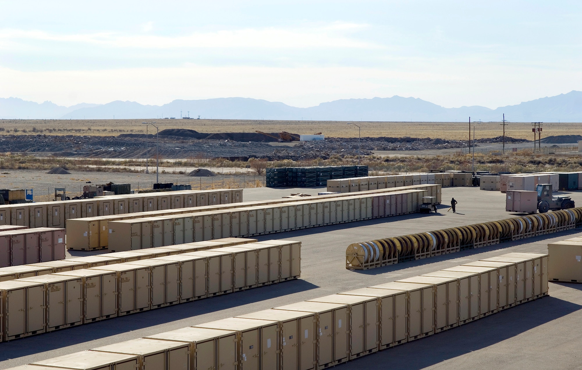 Rows of containment units fill the tarmac for the Basic Expeditionary Airfield Resource, or BEAR, facility of the 49th Material Maintenance Group Jan. 16 at Holloman Air Force Base, N.M. Each containment unit houses a integral piece of a BEAR base set which include tents, kitchens, dining facilities, showers, latrine facilities, power generators and reverse osmosis water purification systems. BEAR assets can be placed, prepared and deployed around the world to support combat operations or humanitarian efforts. (U.S. Air Force photo/Staff Sgt. Bennie J. Davis III) 
