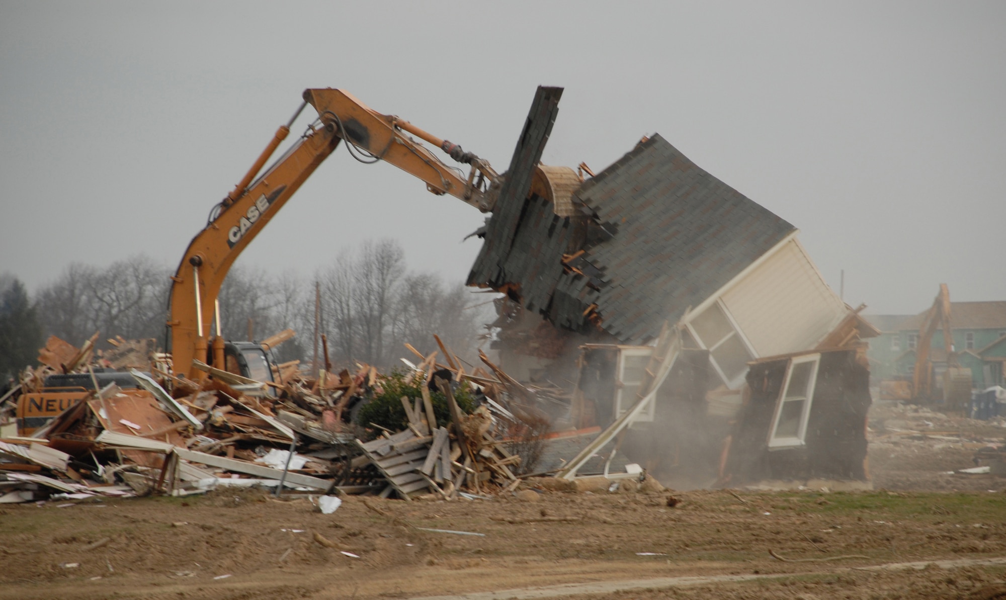 The last of the Dover Air Force Base old housing was demolished Jan. 16. In all, 978 units have been demolished on Dover AFB since 2004 to make way for 980 new homes for all Dover Airmen. The entire projected is scheduled for completion in 2009. (U.S. Air Force photo/Tech. Sgt. Kevin Wallace) 