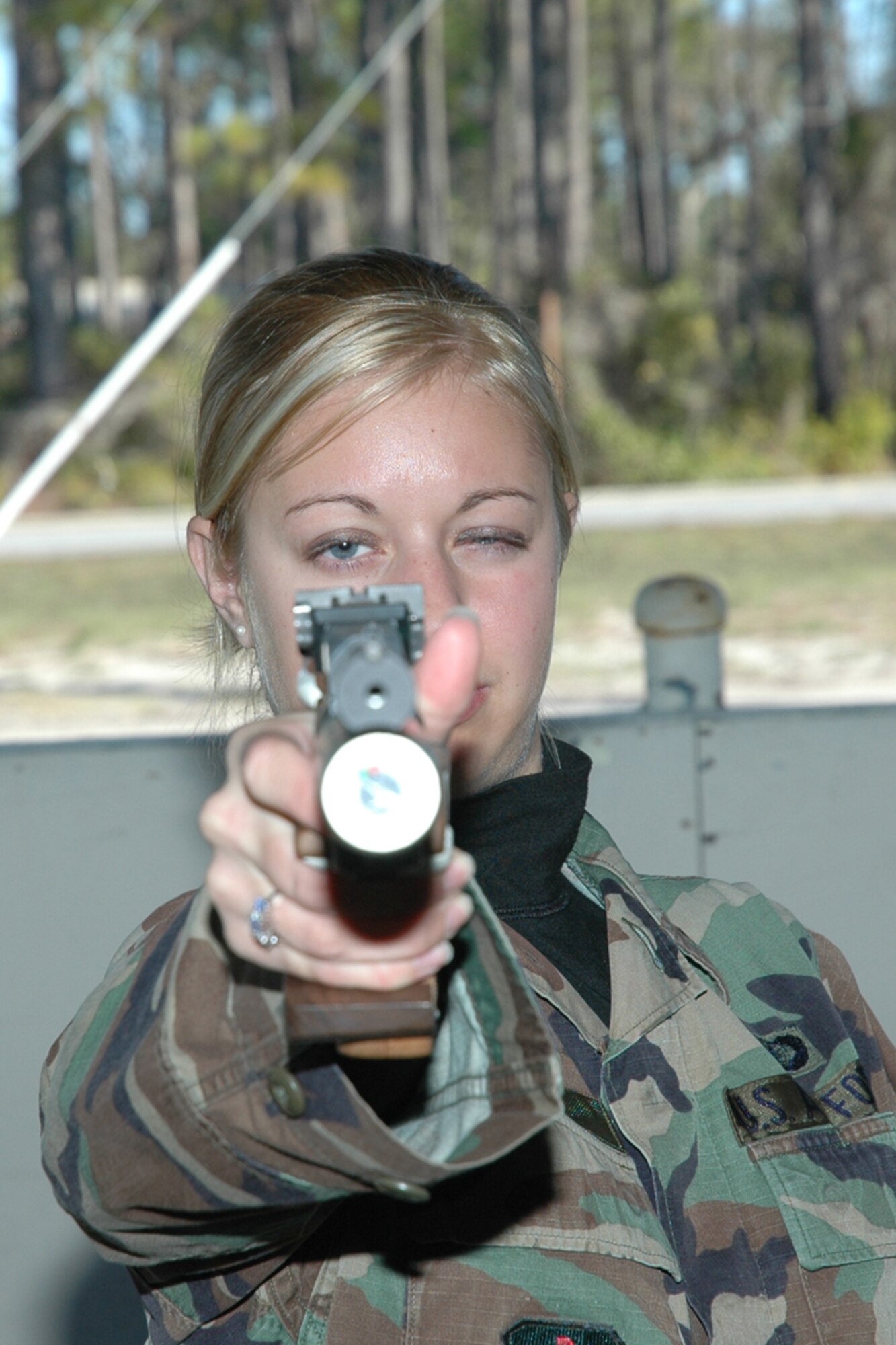 2nd Lt. Caitlin Harris practices air pistol shooting at the Tyndall firing range in preparation for the upcoming 2008 Summer Olympic tryouts held at Colorado Springs, Colo. (U.S. Air Force photo / Chris Dahmer)
