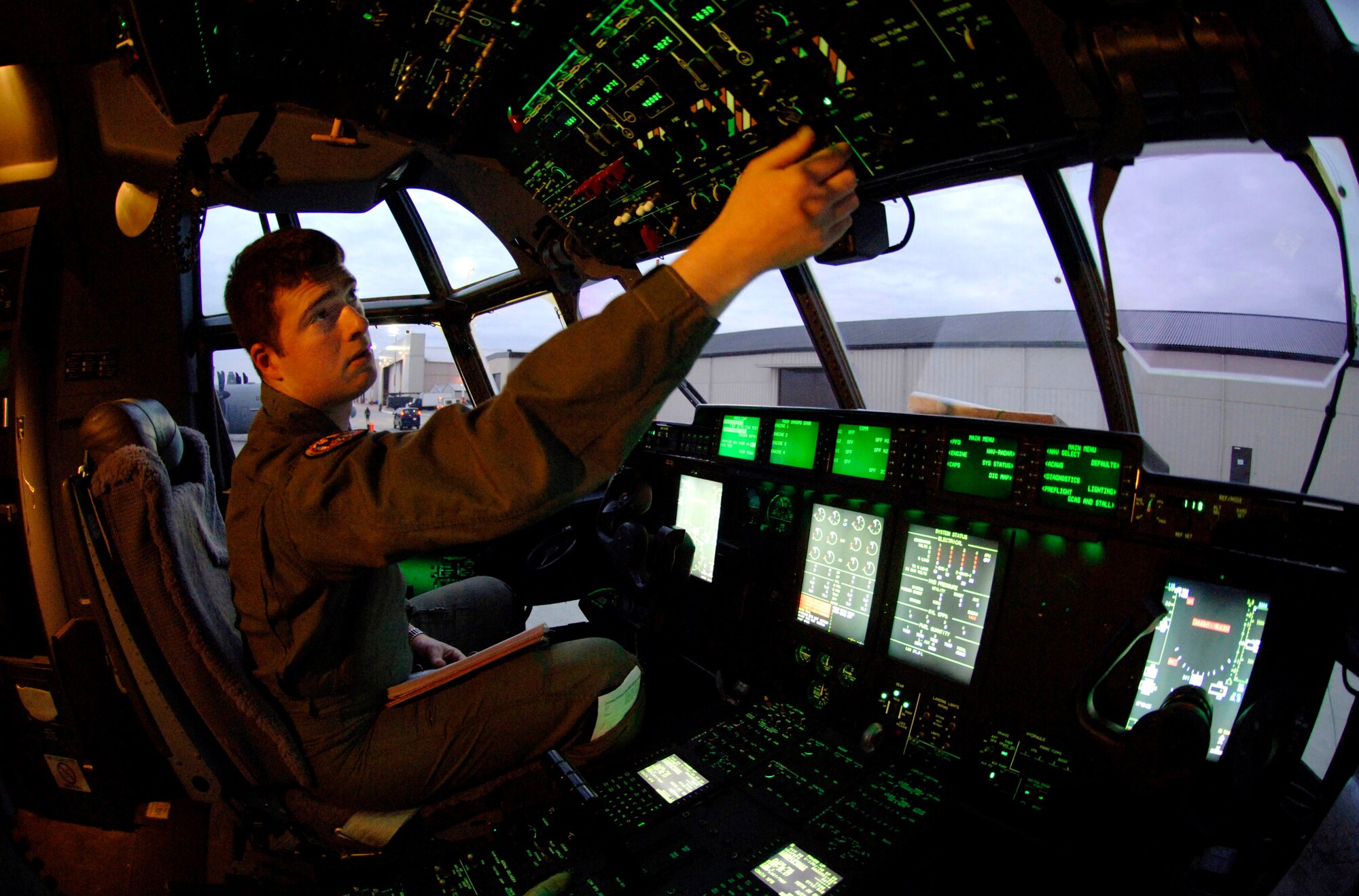 Staff Sgt. Joseph Maker performs preflight start-up on a C-130 Hercules an hour before departure Jan. 9 at Ramstein Air Base, Germany. Sergeant Maker is a loadmaster from the 143rd Airlift Wing at Quanset State Airport in Rhode Island. (U.S. Air Force photo/Master Sgt. Scott Wagers) 
