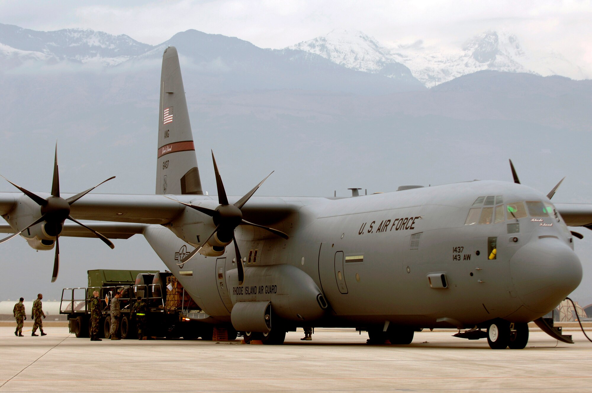 Airmen load 25,000 pounds of cargo onto a C-130 Hercules Jan. 9 at Aviano Air Base, Italy. A six-member Air National Guard-based crew from the 143rd Airlift Wing at Quonset State Airport near Providence, Rhode Island, delivered the cargo to Zaragoza Air Base, Spain, in support of a month-long training exercise for a dozen F-16 Fighting Falcons. (U.S. Air Force photo/Master Sgt. Scott Wagers) 
