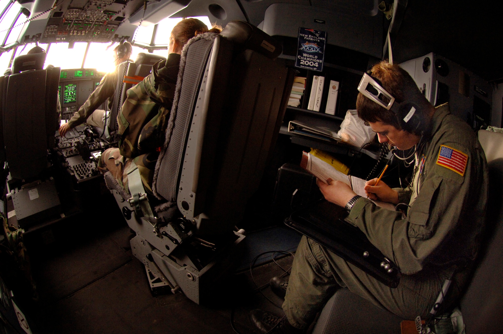Staff Sgt. Joseph Maker annotates weight and balance figures before a C-130 Hercules departs Jan. 9 from Ramstein Air Base, Germany. The six-member crew flying for the 38th Airlift Squadron flew to Aviano Air Base, Italy, where they picked up and deliver 25,000 pounds of cargo bound for Zaragoza Air Station, Spain, in support of an F-16 Fighting Falcon training exercise. Sergeant Maker is a Rhode Island Air National Guard loadmaster with the 143rd Airlift Wing at Quanset State Airport. (U.S. Air Force photo/Master Sgt. Scott Wagers) 
