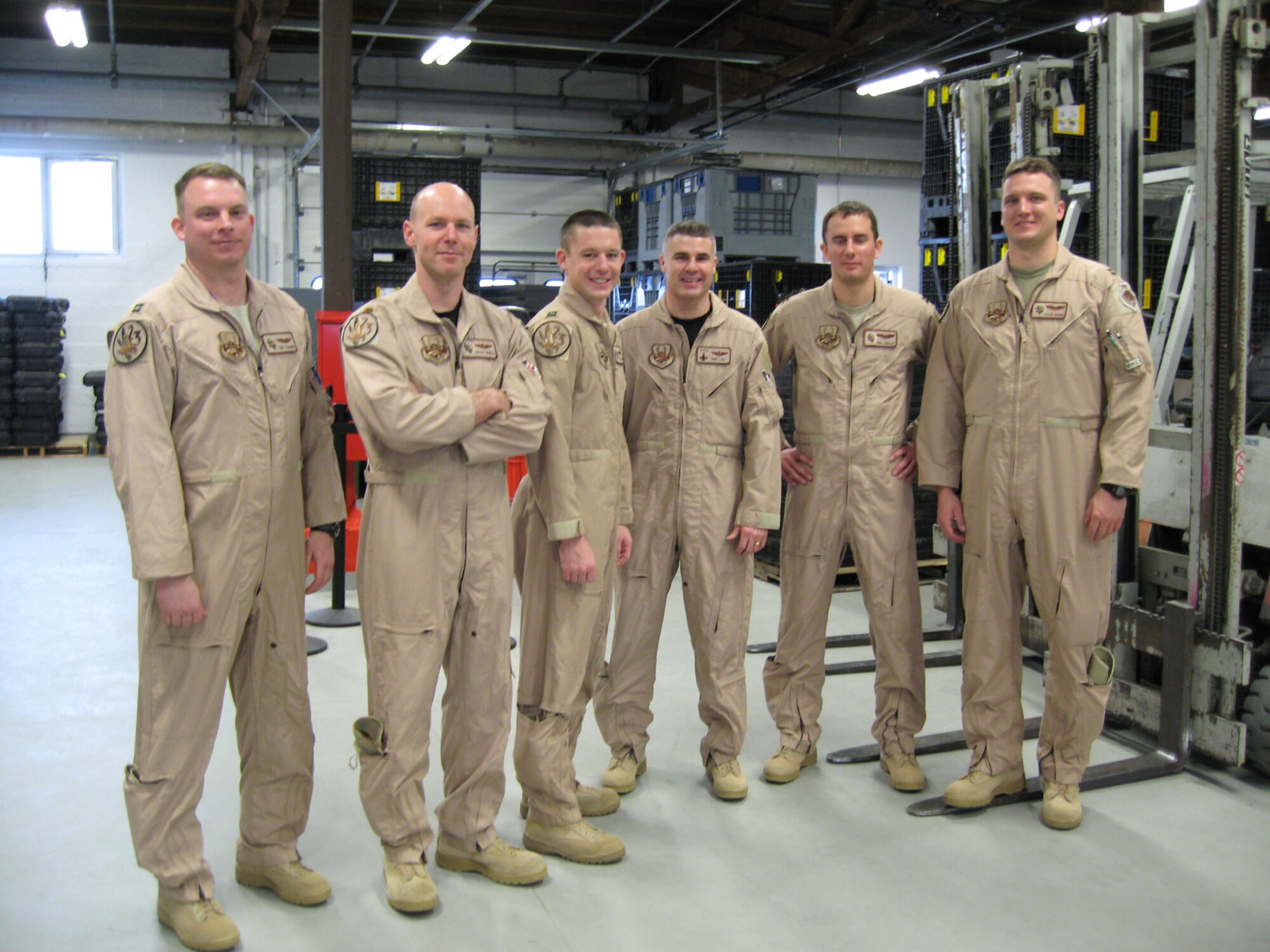 SPANGDAHLEM AIR BASE, Germany – Pilots, from the 23rd Fighter Squadron, wait for a C-5 to take them into the area of responsibility to support Operation Iraqi Freedom Jan. 18, 2008. (U.S. Air Force photo/Staff Sgt. Tammie Moore)