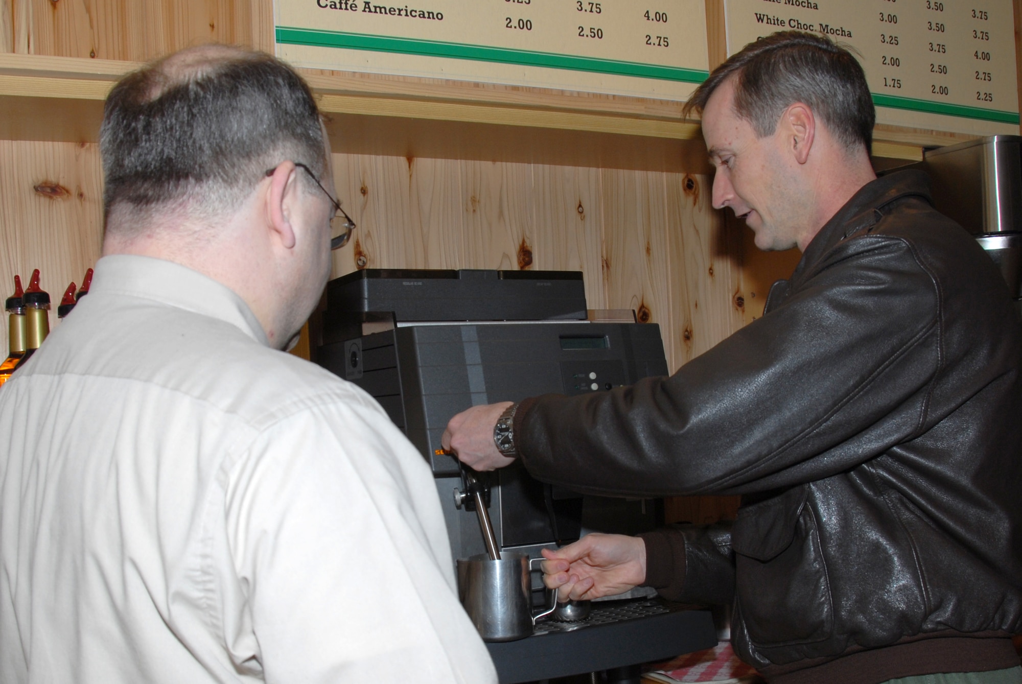 MISAWA AIR BASE, Japan -- Col. T.J. O'Shaughnessy, 35th Fighter Wing commander, makes the first Starbucks coffee during the grand opening of Cafe Aomori, here Jan 22, 2008.  Cafe Aomori participates in the "We Proudly Serve" program allowing them to serve the Starbucks line of products.  (U.S. Air Force photo by Senior Airman Laura R. McFarlane)