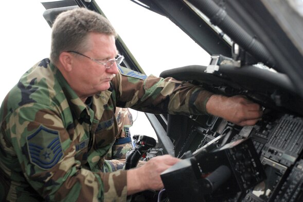 Air Force Reservist Master Sgt. Tom Trommater, 920th Maintenance Squadron, maintains the APR 39 Radar Warning Receiver and the AAR 47 missile approach warning system on an HH-60G Pave Hawk Helicopter during a Unit Training Assembly weekend at Patrick Air Force Base, Fla. (U.S. Air Force Photo/Master Sgt. Ray Padgett)