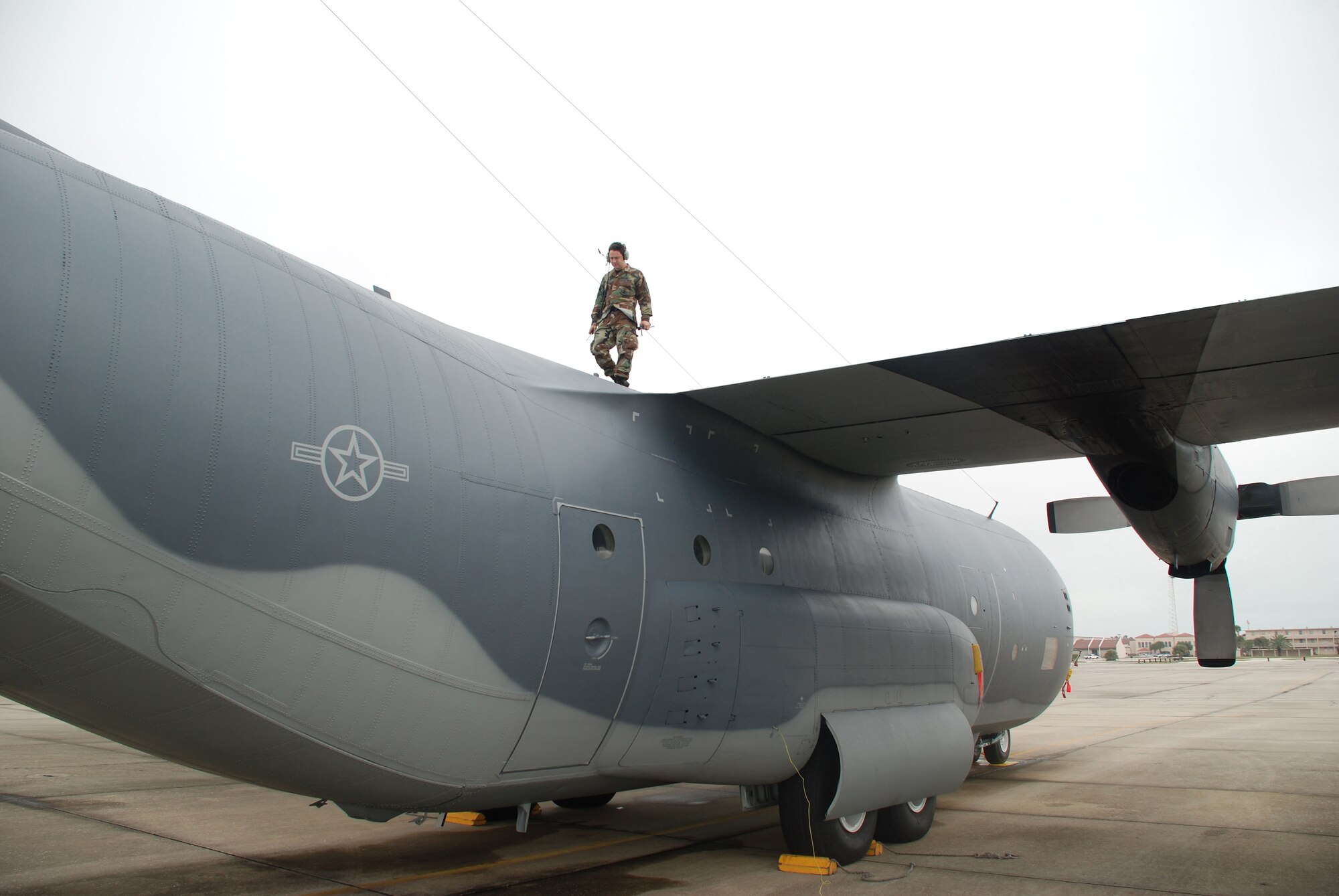 Air Force Reservist Staff Sgt. Jeremy Buck, a crew chief with the 920th Aircraft Maintenance Squadron, performs a visual inspection on the wing of an HC-130 Hercules aircraft during a Unit Training Assembly weekend at Patrick Air Force Base, Fla. (U.S. Air Force Photo/Master Sgt. Raymond F. Padgett)
