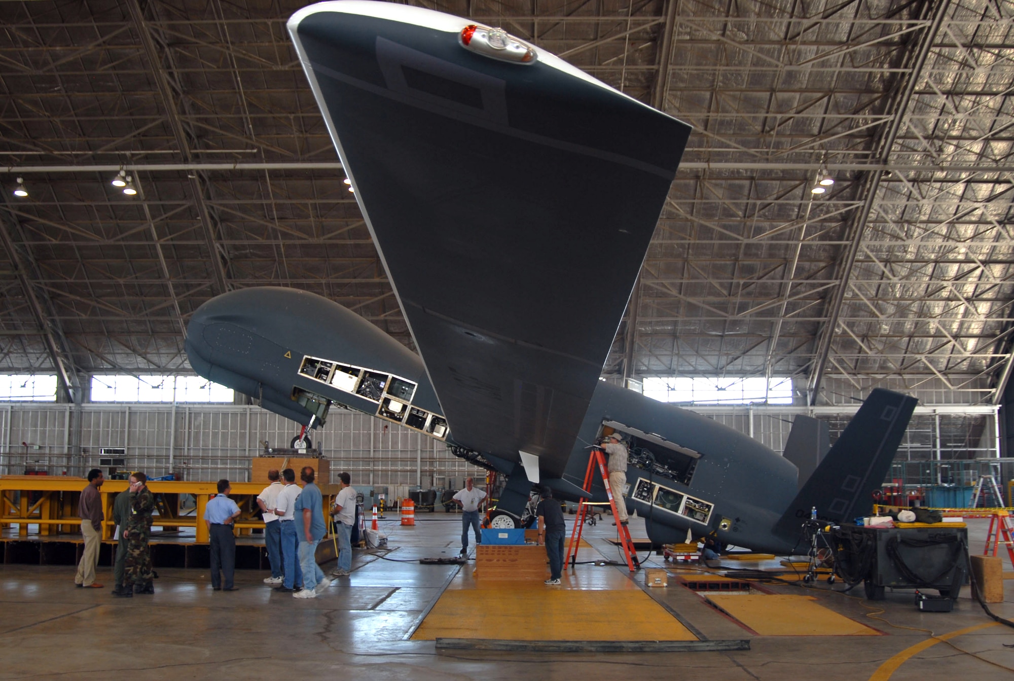 A team of engineers and maintainers raised the nose of the RQ-4 Global Hawk to achieve a 20-degree angle during the fuel starvation testing, at Edwards Air Force Base, Calif, in October. The team included members from the Northrop-Grumman organization, Air Force Flight Test Center and the 452nd Flight Test Squadron. (U.S. Air Force photo/Airman 1st Class Mike Young)  