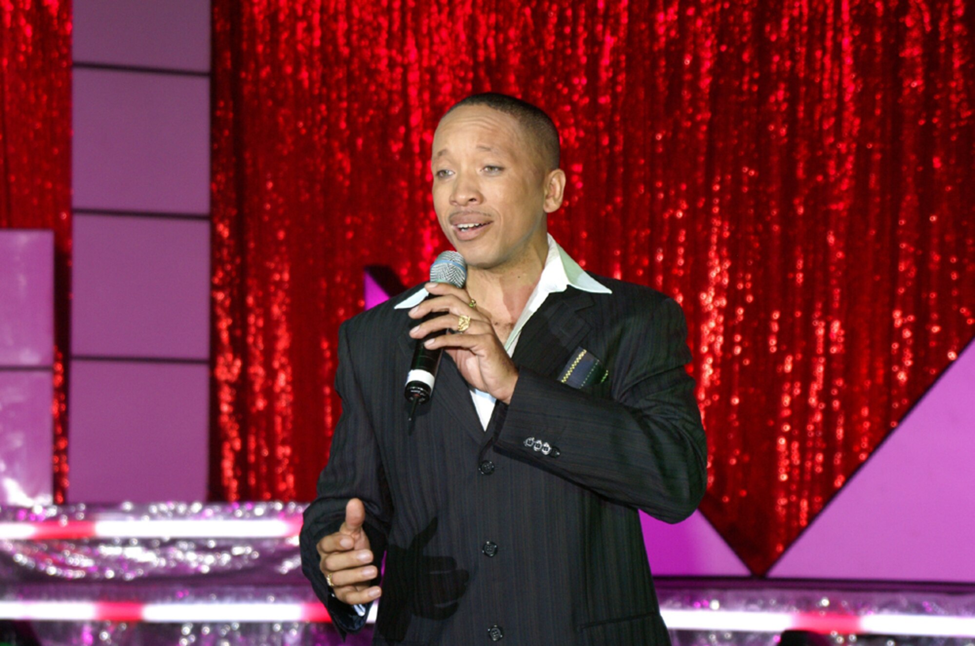 Technical Sgt. Keith Martin, 43rd Flying Training Squadron, performs as a vocalist with the 2007 Tops in Blue. The Tops in Blue will perform for the BLAZE Team Feb. 4 at the Rent Auditorium on the Mississippi University for Women campus. (U.S. Air Force photo)