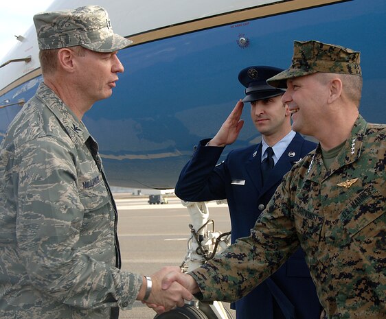 Col. John "Red" Millander, 437th Airlift Wing commander, greets Marine General James E. Cartwright, Vice Chairman of the Joint Chiefs of Staff Jan. 23, on the Charleston AFB flightline. Gen. Cartwright stopped at Charleston AFB before heading to the Space and Naval Warfare Systems Center Charleston, S.C. to see the integration, testing and installation of advanced electronic systems on the MRAP vehicles. (U.S. Air Force photo/Airman 1st Class Katie Gieratz) 