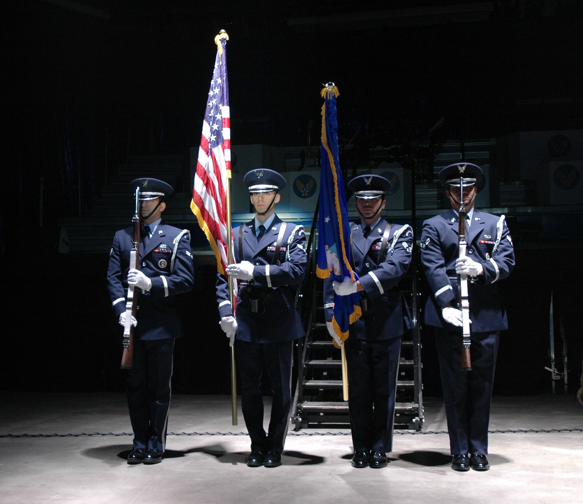 Members of Malmstrom Air Force Base honor guard present the colors prior to the 142nd Tops in Blue performance of the year at the Four Season's Arena in Great Falls Jan. 22. Tops in Blue is an all active-duty U.S. Air Force special unit comprised of 28 members picked for their talents in entertaining. The group sets up their own equipment weighing in at about 60,000 pounds and performs at 160 locations per year including deployed locations such as Afghanistan and Kyrgyzstan. This year's theme is “The Fly-By”, commemorating the Air Force's 60th Anniversary. (U.S. Air Force photo/Airman 1st Class Dillon White)