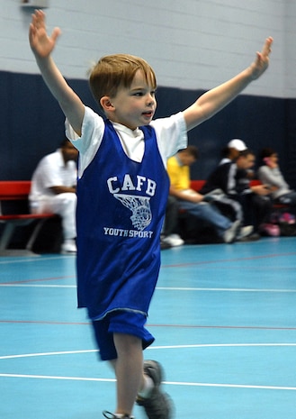 Oliver Heaviside, 5, from the Charleston AFB Royals, signals that he is open to his teammates at the Charleston AFB Youth Center Jan. 20. (U.S. Air Force photo/Tech. Sgt. Paul Kilgallon)