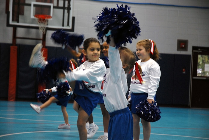 The "Charleston Cheerleaders" perform during the half-time session of the Charleston AFB five-to-six-year-old game Jan. 20 at the Youth Center. "The Charleston Cheerleaders" consist of 10 girls from ages three to six.  (U.S. Air Force photo/Tech. Sgt. Paul Kilgallon)