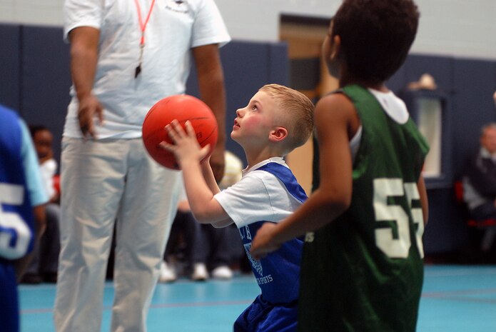 Trey Westry, 5, from the Charleston AFB Royals, lines up his shot before making a basket at the Charleston AFB Youth Center Jan. 20. (U.S. Air Force photo/Tech. Sgt. Paul Kilgallon)