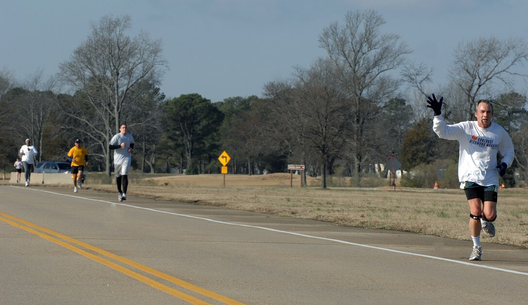 LANGLEY AIR FORCE BASE, Va. -- Owen Dwire waves during the 5K Polar Bear Run here Jan. 23. Mr. Dwire, Air Combat Command Directorate of Air and Space Operations Security Assistance Fighter Program manager, finished the run in less than 26 minutes. The winners of the 5K are as follows: Women Under 34 category – Adonis White; Men Under 34 category – Jamal Lofton; Men 35-49 category – John DeGoes; Men 50 and Over category – George Hays. (U.S. Air Force photo/Airman 1st Class Vernon Young)