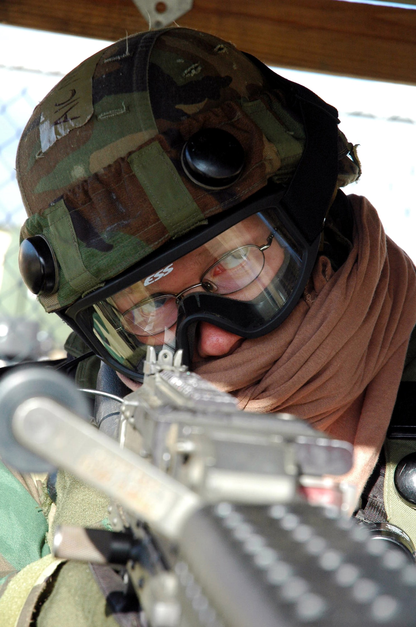 Airman 1st Class Tyler Mullenhauer reacts to a scenario for Exercise Eagle Flag 08-2 Jan. 20 at Naval Air Engineering Station Lakehurst, N.J. Airman Mullenhauer is a security forces Airman from the 60th Security Forces Squadron from Travis Air Force Base, Calif. The exercise is operated by members of the Air Force Expeditionary Center's Expeditionary Operations School and 421st Combat Training Squadron at Fort Dix, N.J. (U.S. Air Force photo/Tech. Sgt. Scott T. Sturkol) 
