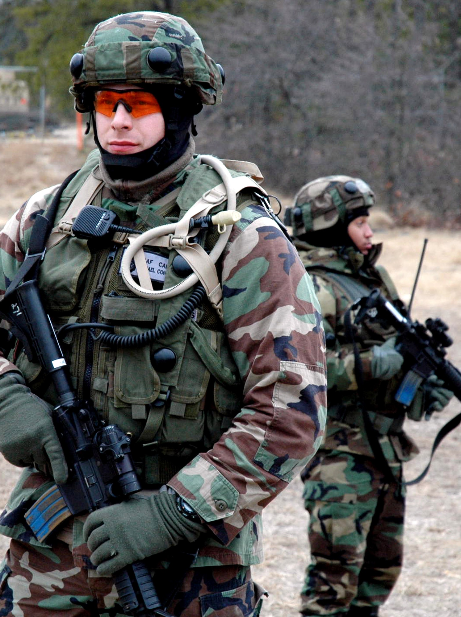 Capt. Michael Cohen and Airman 1st Class Jackson Calvin watch over a checkpoint during operations for Exercise Eagle Flag 08-2 Jan. 19 at Naval Air Engineering Station Lakehurst, N.J. The exercise is operated by members of the Air Force Expeditionary Center's Expeditionary Operations School and 421st Combat Training Squadron at Fort Dix, N.J. Captain Cohen and Airman Calvin are assigned to the 570th Contingency Response Group from Travis Air Force Base, Calif. (U.S. Air Force photo/Tech. Sgt. Scott T. Sturkol) 

