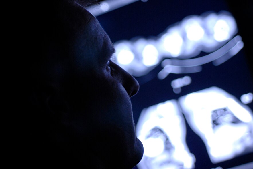 Maj. David Ives, 56th Medical Operations Squadron Diagnostic Imaging Flight commander views a chest CT scan. CT scans are used to locate abnormalities in the head, chest and abdomen. (photo by Staff Sgt. Christopher Hummel)