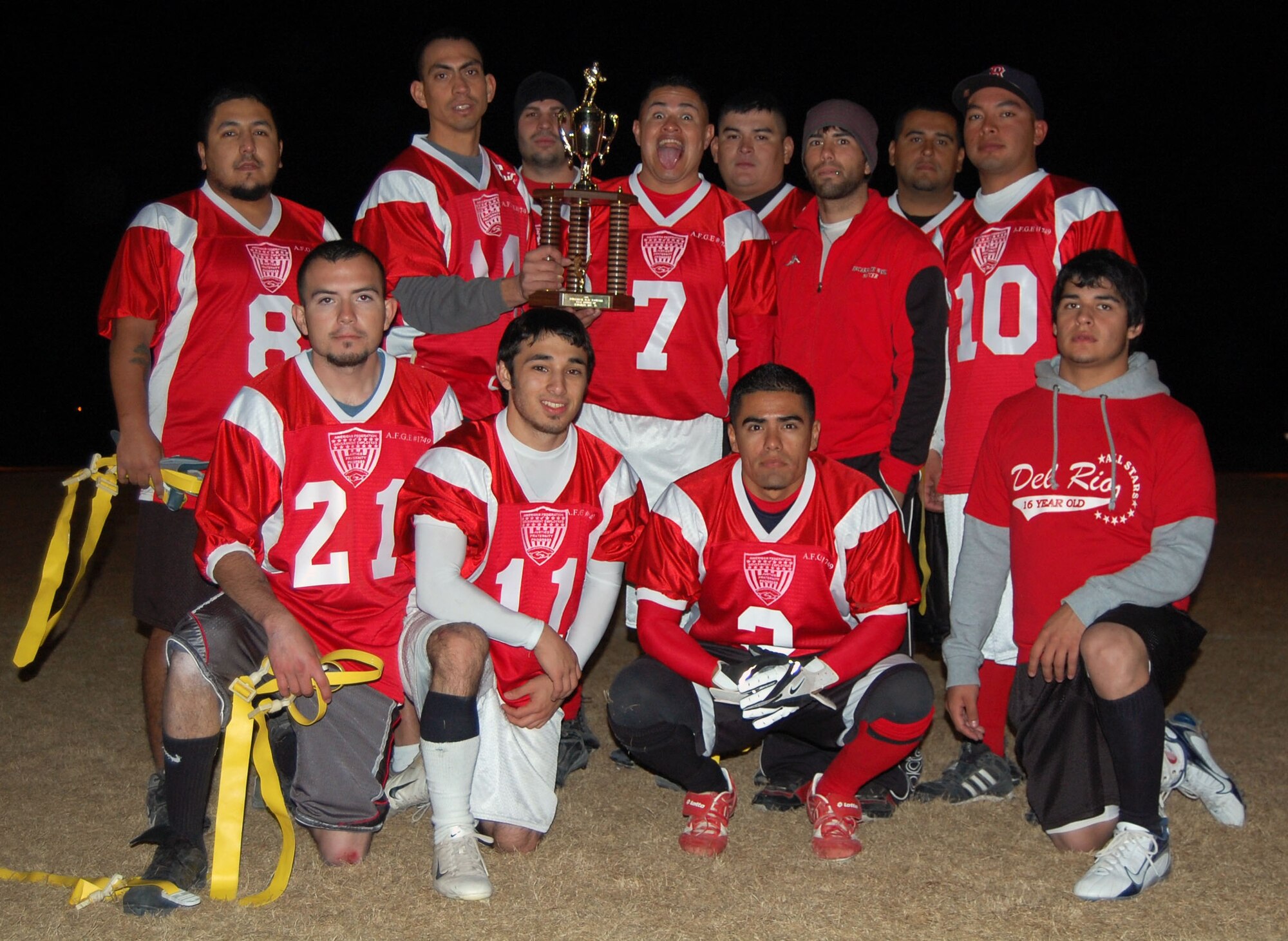 LAUGHLIN AIR FORCE BASE, Texas-- The AFGE claims their runner-up trophy Jan. 23 at the flag football championship game.  “At the beginning of the season we didn’t think we would make it this far.  We’ve really improved and we’re pretty proud our ourselves,” said Albert Vargas, one of the AFGE coaches.  This was the first year AFGE advanced to the championship game.  (U.S. photo by 2nd Lt. Courtney Kippenberger)