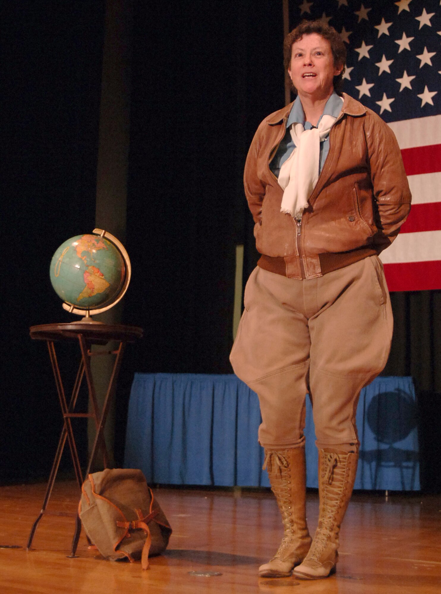 MCCONNELL AIR FORCE BASE, Kan. -- Ann Birney, historical performer, speaks on the life of Amelia Earhart through the character of Amelia at the Robert J. Dole Center, Jan. 23. Performing highlights on Amelia’s major life breakthroughs included her career as a female aviator, her childhood and mysteries surrounding her death. (Photo by Airman 1st Class Maria Ruiz)