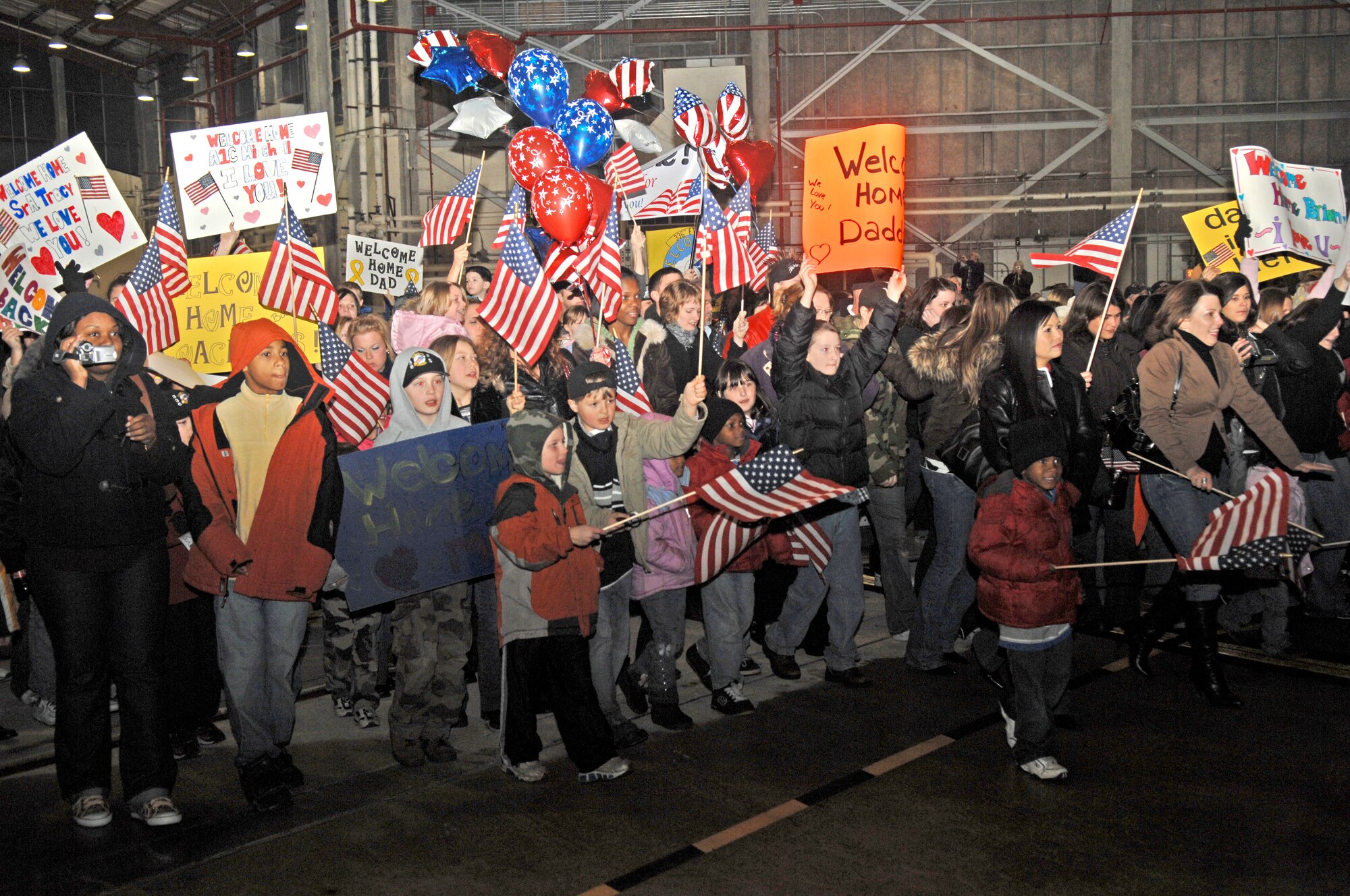 SEYMOUR JOHNSON AIR FORCE BASE, N.C. ? Families brave the cold to await their family members to return from deployment on January 19.(U.S. Air Force photo by Senior Airman Jessica Klingler)
