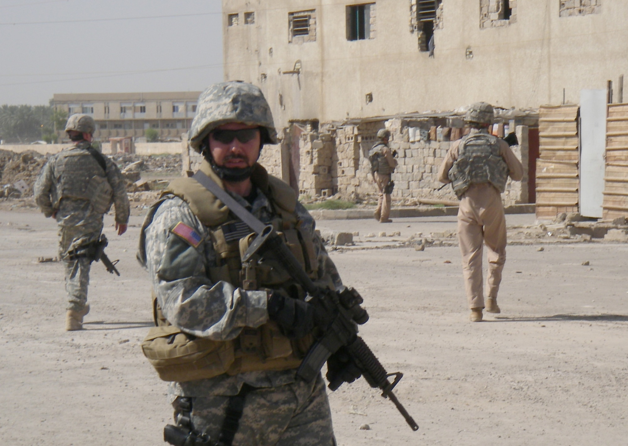 Air Force Office of Special Investigations Special Agent Terry Krebs on patrol in Baghdad. AFOSI agents listen carefully and watch for clues, gathering information that will help them zero in on the insurgents they seek. (U.S. Air Force photo)
