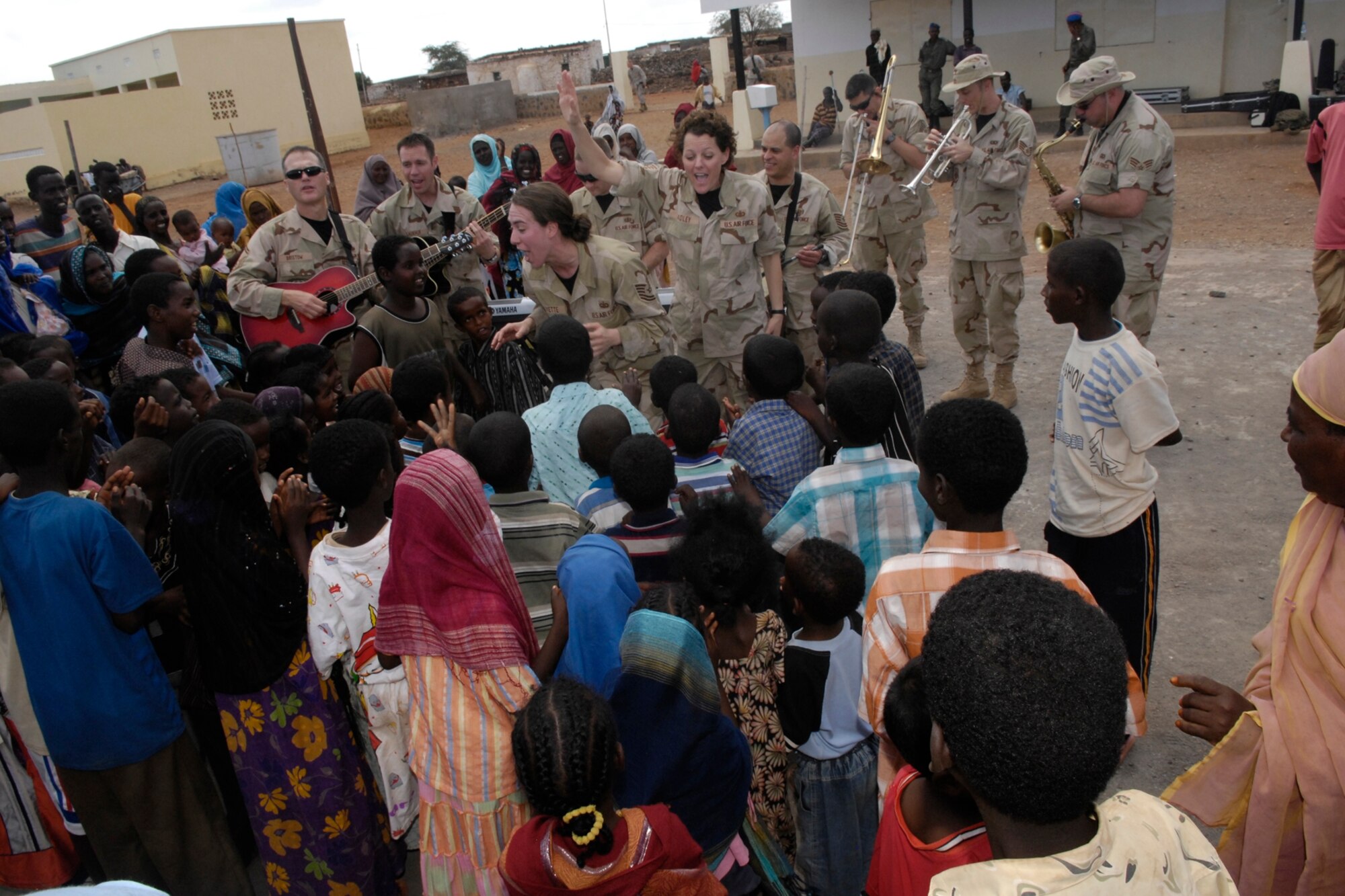 The CENTAF Band performs at the village of Chebellier, Djibouti in Africa on January 23, 2008. The CENTAF Band "Live Round" will be performing eight shows in 5 days in Africa for the base and the local community. (U.S. Air Force Photo By: Staff Sgt. Christina M. Styer) 

