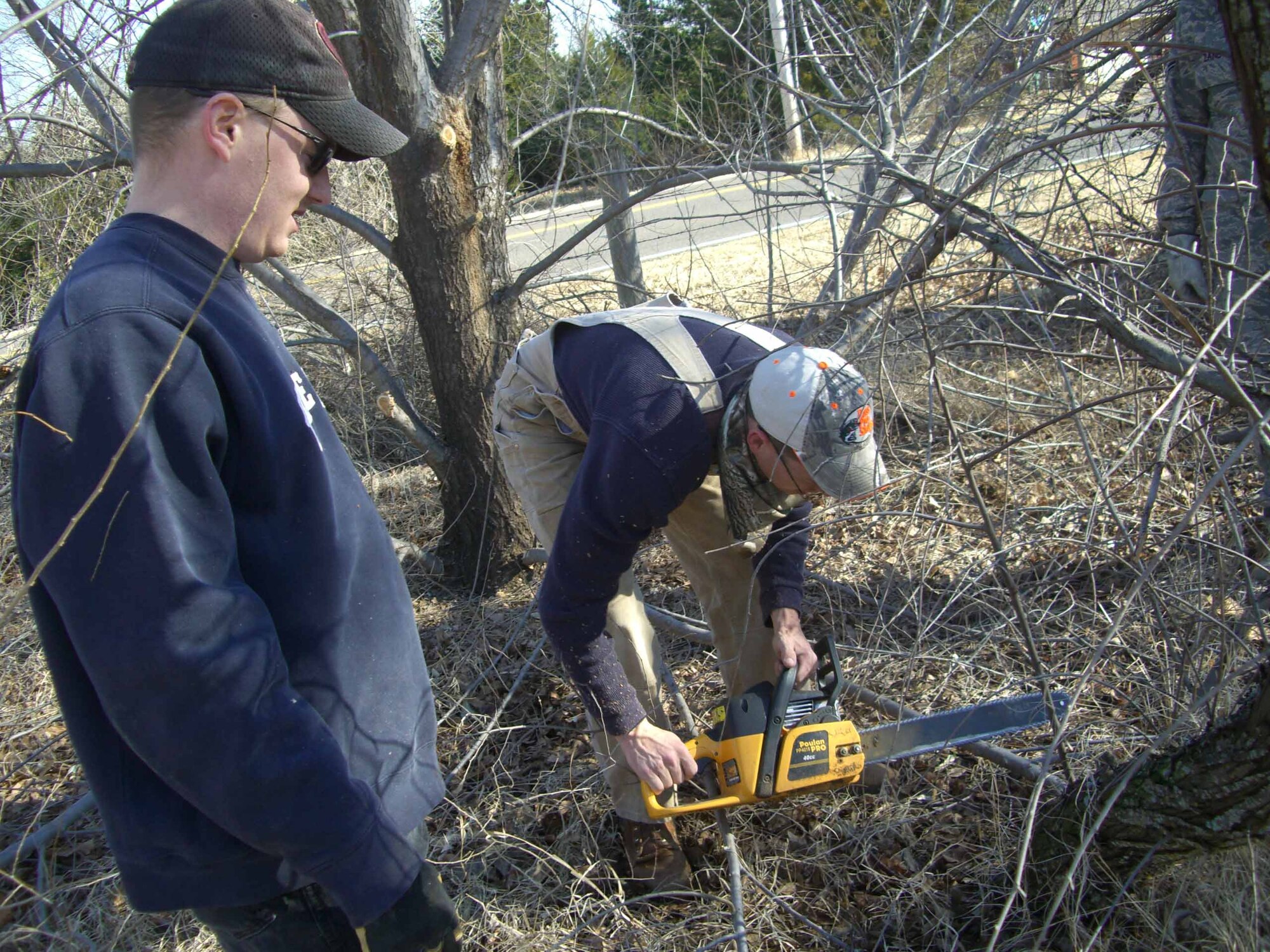 Tinker's 3rd Combat Communications Group volunteered their time to help Edmond Electric and the City of Edmond clean up trees and debris from the ice storm.  More than 30 members of the 3rd Herd met at the Festival Market Place Jan. 18 to receive addresses of the people in need.  They plan to clean up about 30 elderly or disabled people's homes.  (Courtesy photo)