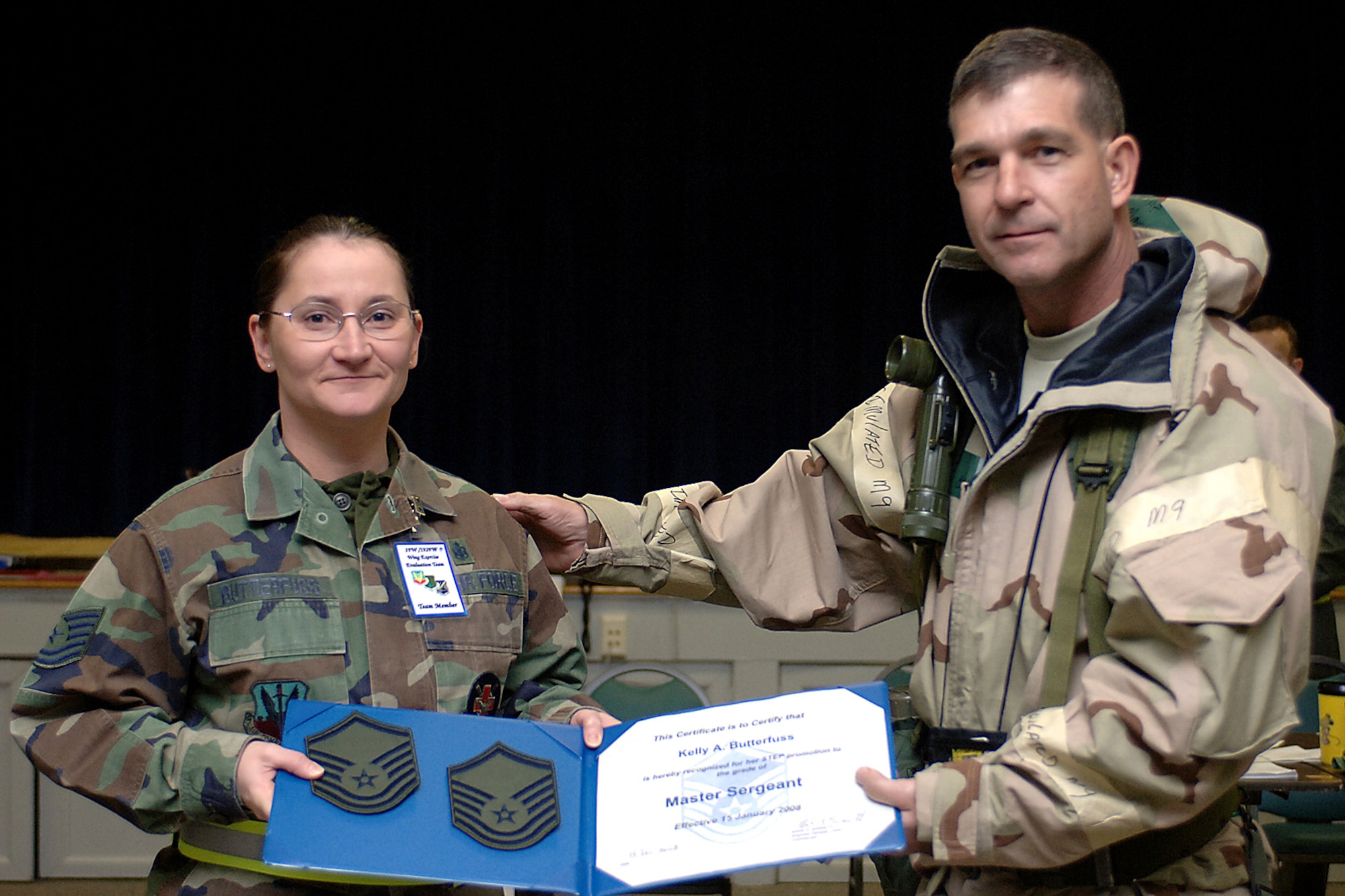 LANGLEY AIR FORCE BASE, Va. -- Master Sgt. Kelly Butterfuss, 1st Medical Operations Squadron noncommissioned officer in charge of pediatrics, was promoted under the Stripes for Exceptional Performers program by Brig. Gen. Mark Barrett, 1st Fighter Wing commander, Jan. 15. (U.S. Air Force photo/Staff Sgt. Michelle Arslan)