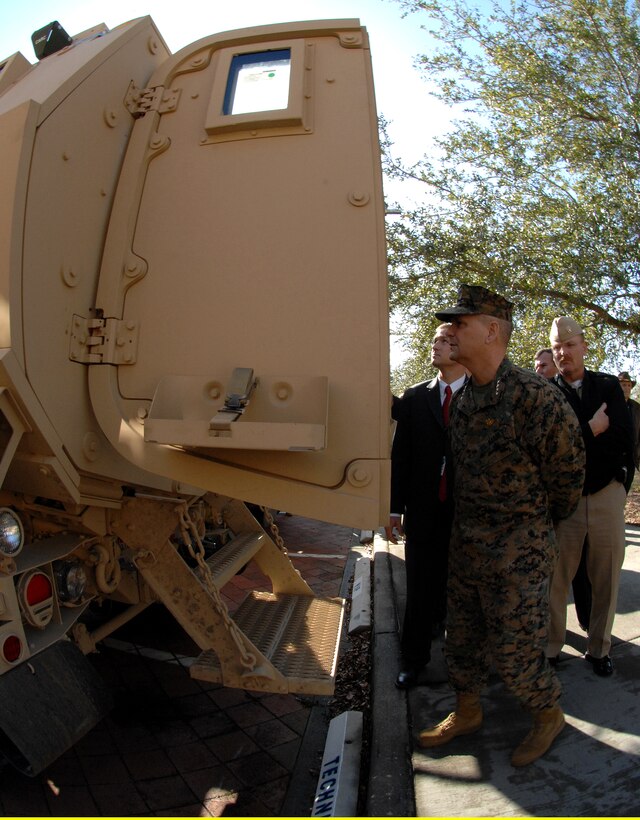 Marine Corps Gen. James E. Cartwright, vice chairman of the Joint Chiefs of Staff, looks inside a mine resistant ambush protected vehicle outside the SPAWAR Integrated Product Center Lab in Charleston, S.C., Jan. 23, 2008. Cartwright visited several production facilities to see firsthand how MRAP vehicles are made and shipped to troops in Iraq.