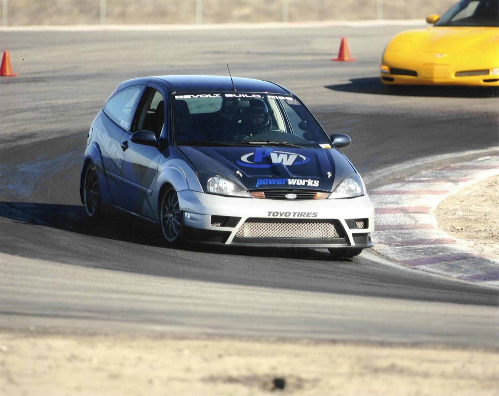 Technical Sgt. Chris Stout, 163rd  Reconnaissance Wing, March Air Reserve Base, Calif., concentrates as he goes in to a sharp turn during an Open Track Day event at Buttonwillow Raceway Park in California.  (U.S. Air Force photo submitted by Tech. Sgt. Chris Stout)