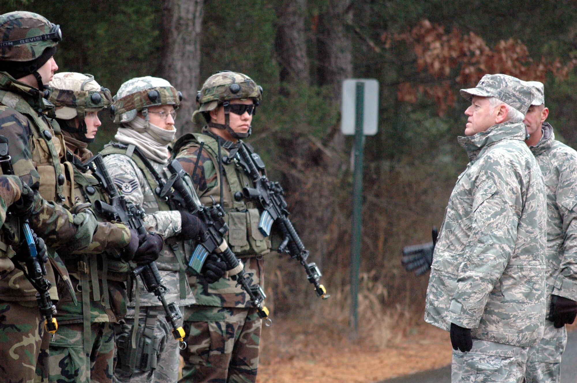 Gen. Arthur Lichte, Air Mobility Command commander, talks with security forces students in the U.S. Air Force Expeditionary Center's Phoenix Warrior training course at Naval Air Engineering Station Lakehurst, N.J., during an visit to the Center Jan. 22.  The official visit by the mobility commander provided a full spectrum of the USAF EC's capabilities in training, innovation and facilities.  (U.S. Air Force Photo/Tech. Sgt. Scott T. Sturkol)