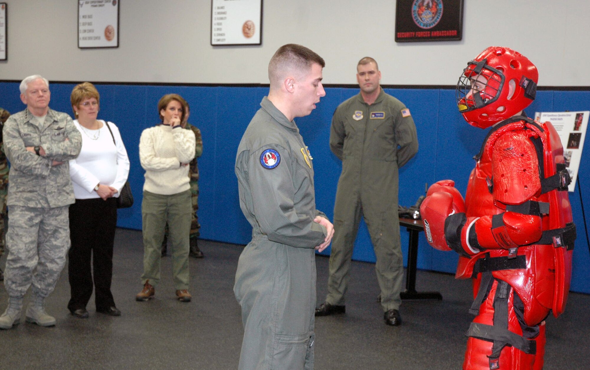 Gen. Arthur Lichte, Air Mobility Command commander and his wife Chris Lichte observe a Phoenix Raven demonstration during General Lichte's visit to the Center Jan. 22 on Fort Dix, N.J.  The official visit by the mobility commander provided a full spectrum of the USAF EC's capabilities in training, innovation and facilities.  Raven training is completed by Center's Expeditionary Operations School and the 421st Combat Training Squadron.  (U.S. Air Force Photo/Tech. Sgt. Scott T. Sturkol)