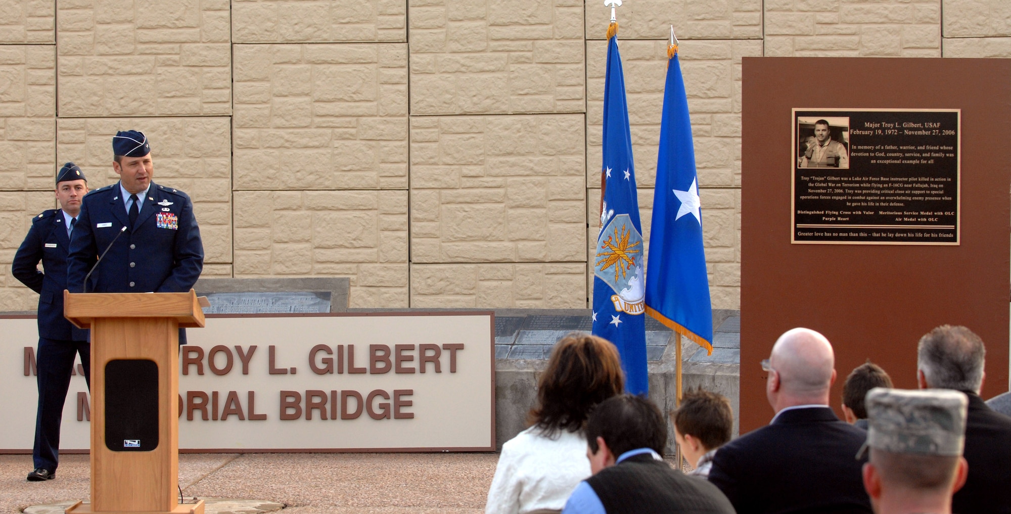 Brig. Gen. Noel T. "Tom" Jones speaks to those in attendance at the grand opening of the Litchfield overpass dedicated to Maj. Troy L. Gilbert Jan. 25 at Luke Air Force Base, Ariz. Major Gilbert was killed in Baghdad Nov. 27, 2006. After 14 months of construction, people at Luke AFB can get from one side of the base to the other without ever leaving a gate, now that base officials have opened the overpass crossing Litchfield Road. (U.S. Air Force photo/Tech. Sgt. Raheem Moore) 
