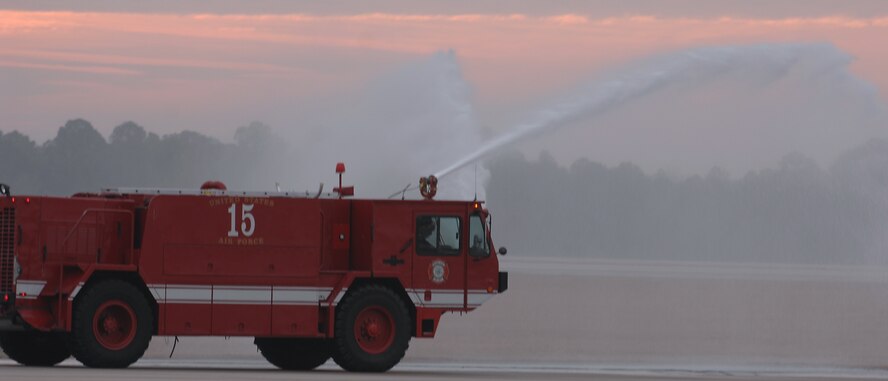 MOODY AIR FORCE BASE, Ga. --  Airman 1st Class Lucas Garduno and Staff Sgt. Matt Kenney, fire fighters of the 23rd Civil Engineering Squadron, check the functions on fire truck, Crash 15, during the fire fighters morning checks on gear and vehicles here, Jan. 24. Functionality of their gear is a high priority for the 23rd CES. (U.S. Air Force photo by Airman 1st Class Brittany Barker)