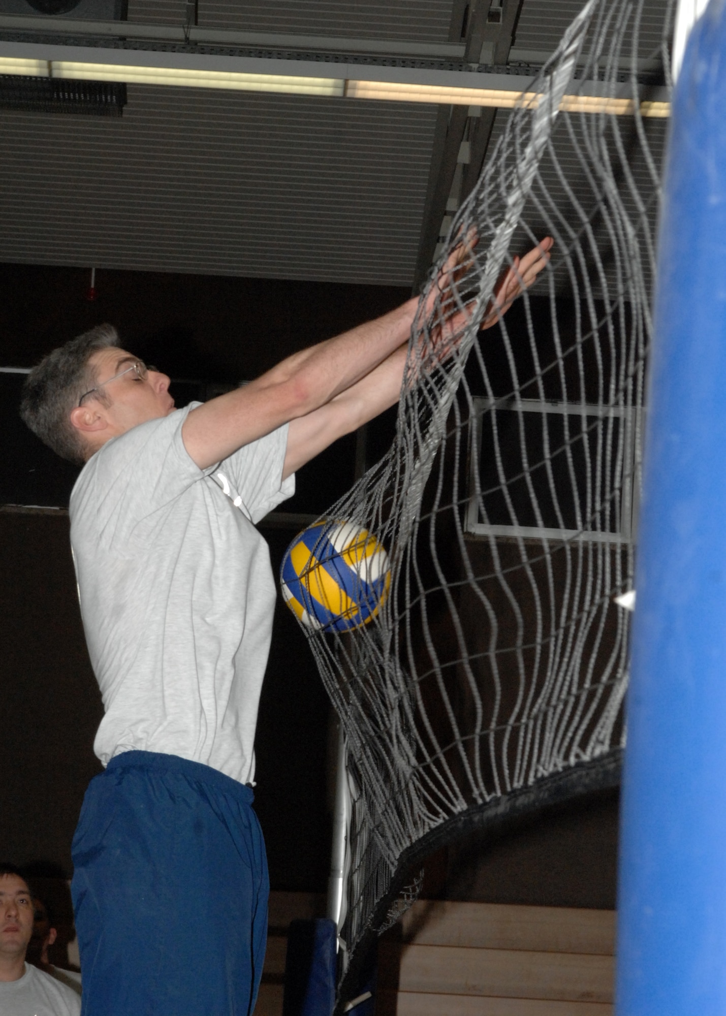 SPANGDAHLEM AIR BASE, Germany – Master Sgt. Jeff Dawson, 52nd Communications Squadron, takes one for the Top 3 team in the volleyball game against the Tier II at the Skelton Memorial Fitness Center Jan. 25, 2008. (U.S. Air Force photo/Airman 1st Class Jenifer Calhoun)