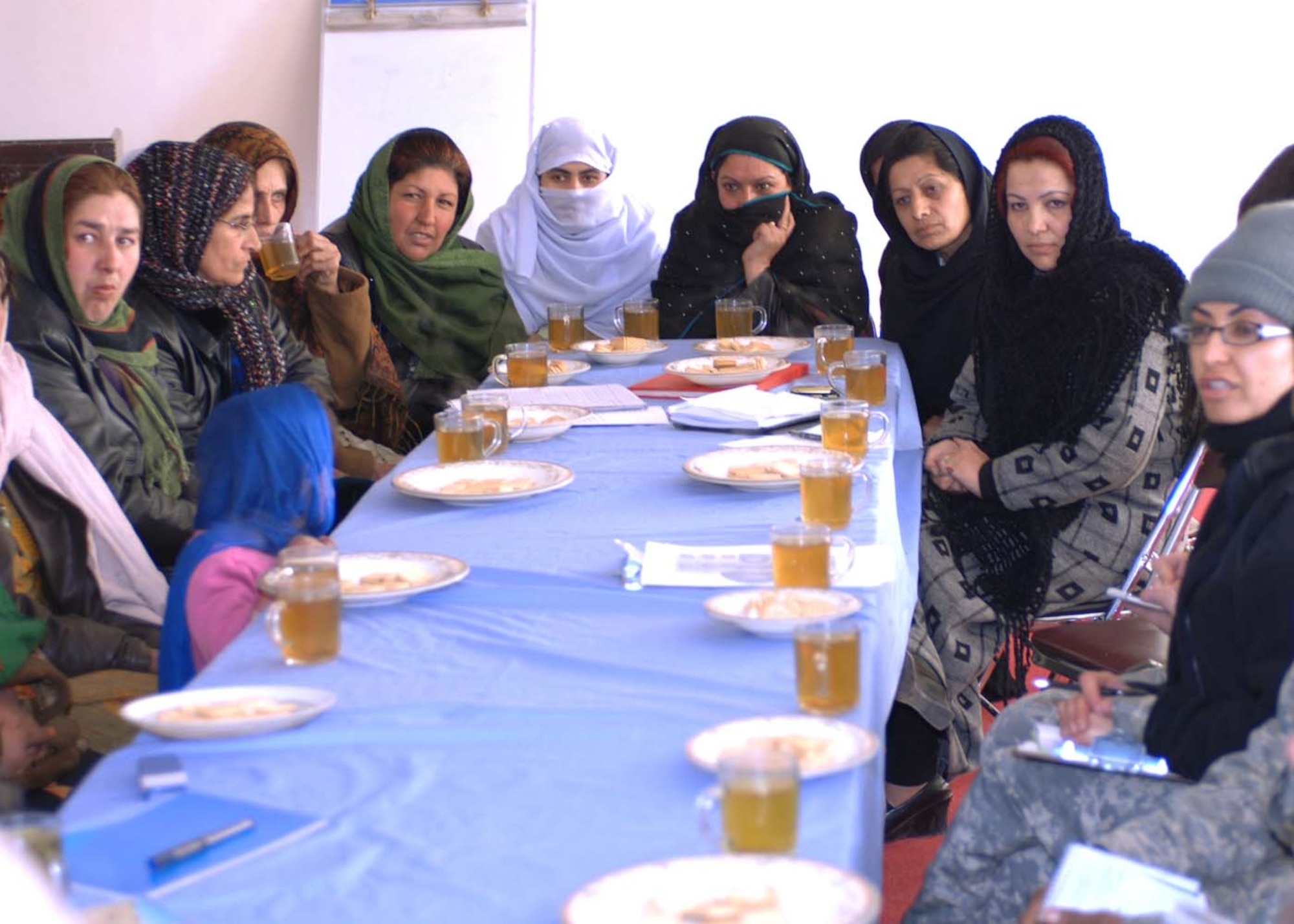 KAPISA PROVINCE, Afghanistan – Women from the Kapisa Province met with the Bagram Provincial Reconstruction Team Jan. 22 to discuss issues within their respective districts. The women were representatives from six of the seven districts in the province. (U.S. Air Force photo by SFC Henry Rodriguez)
