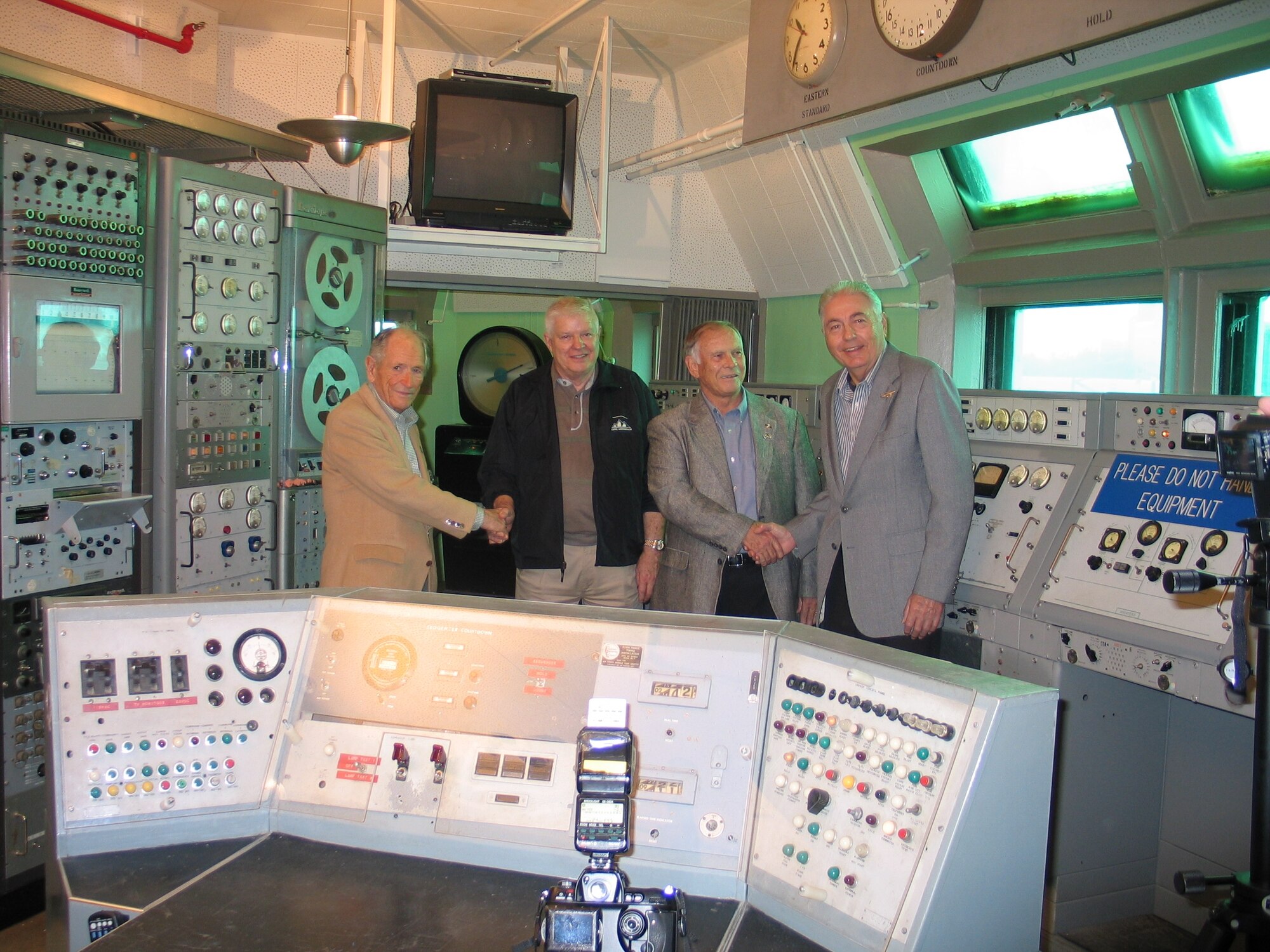 Explorer 1 veterans (from left) Ike Rigell, Terry Greenfield, Norm Perry and John Meisenheimer Sr. reminisce recently inside the original blockhouse at Launch Complex 26 at Cape Canaveral AFS.  All four played critical roles in launching America’s first satellite and believe the mission vaulted America firmly into the Space Age.  (USAF Photo by Ken Warren)