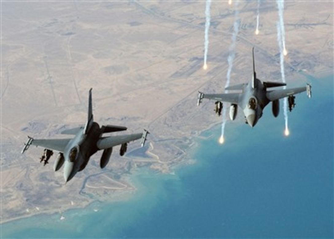 A U.S. Air Force F-16C Fighting Falcon launches electronic countermeasure flares following an aerial refueling mission over Iraq on Jan. 22, 2008.  The aircraft are attached to the332nd Air Expeditionary Wing, Balad Air Base, Iraq.  