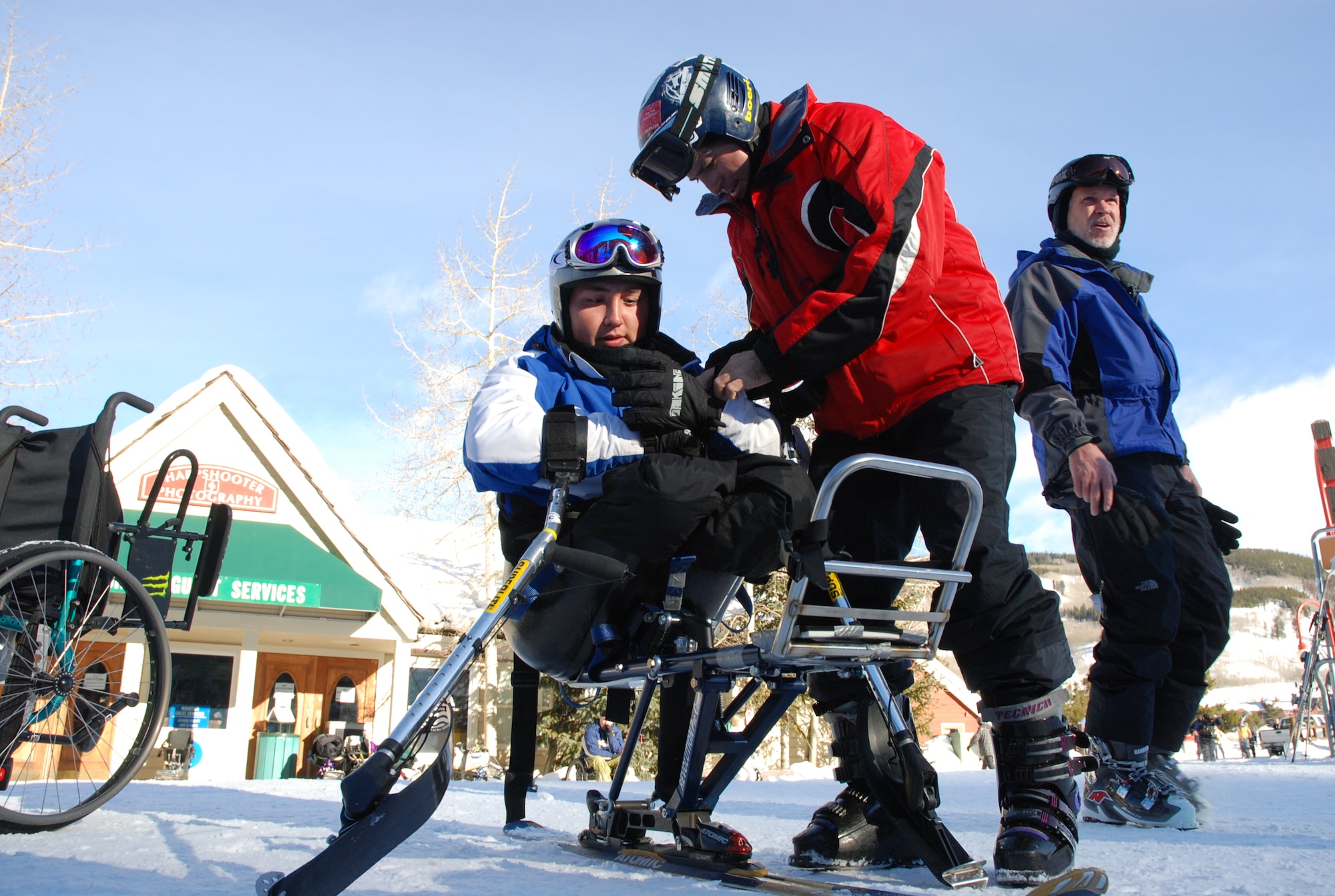 Airman 1st Class Kevin Krogh gets last-minute preparations before tackling the ski slopes in Keystone, Colo., Jan. 26. Airman Krogh, who was injured during an automobile accident, is an F-22 Raptor weapons loaders assigned to Langley AFB, Va. Airman Krogh, together with several other disabled servicemembers, took advantage of the company's free ski lessons offered during the annual SnoFest military community event in Keystone, Colo. (U.S. Air Force photo/Senior Airman Stephen Collier)