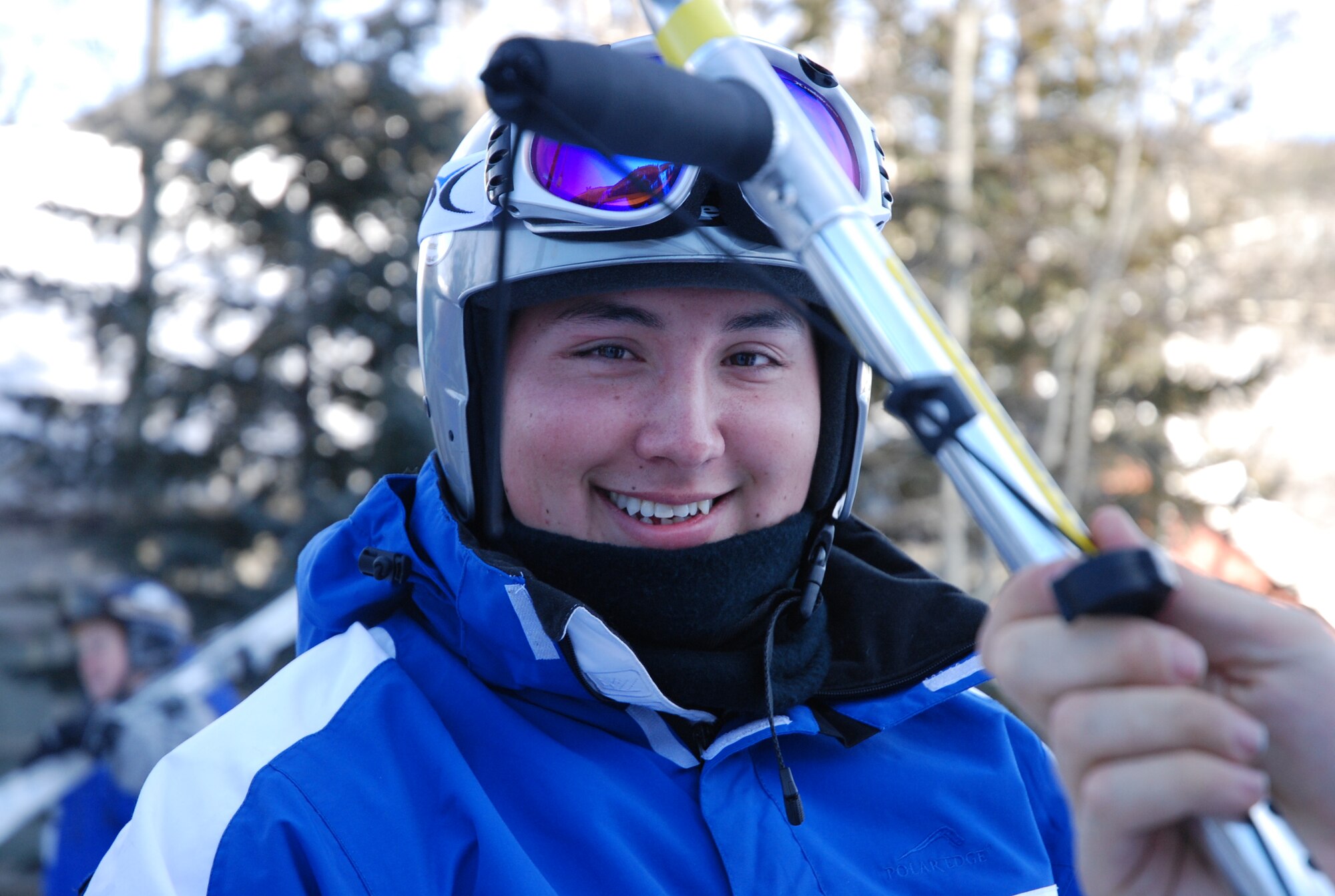 Airman 1st Class Kevin Krogh shows off his spirit before tackling the Haywood slope at Keystone Resort, Colo. Jan. 26. Airman Krogh, who was injured during an automobile accident, is an F-22 Raptor weapons loaders assigned to Langley AFB, Va. Airman Krogh, together with several other disabled servicemembers, took advantage of the company's free ski lessons offered during the annual SnoFest military community event in Keystone, Colo. (U.S. Air Force photo/Senior Airman Stephen Collier)