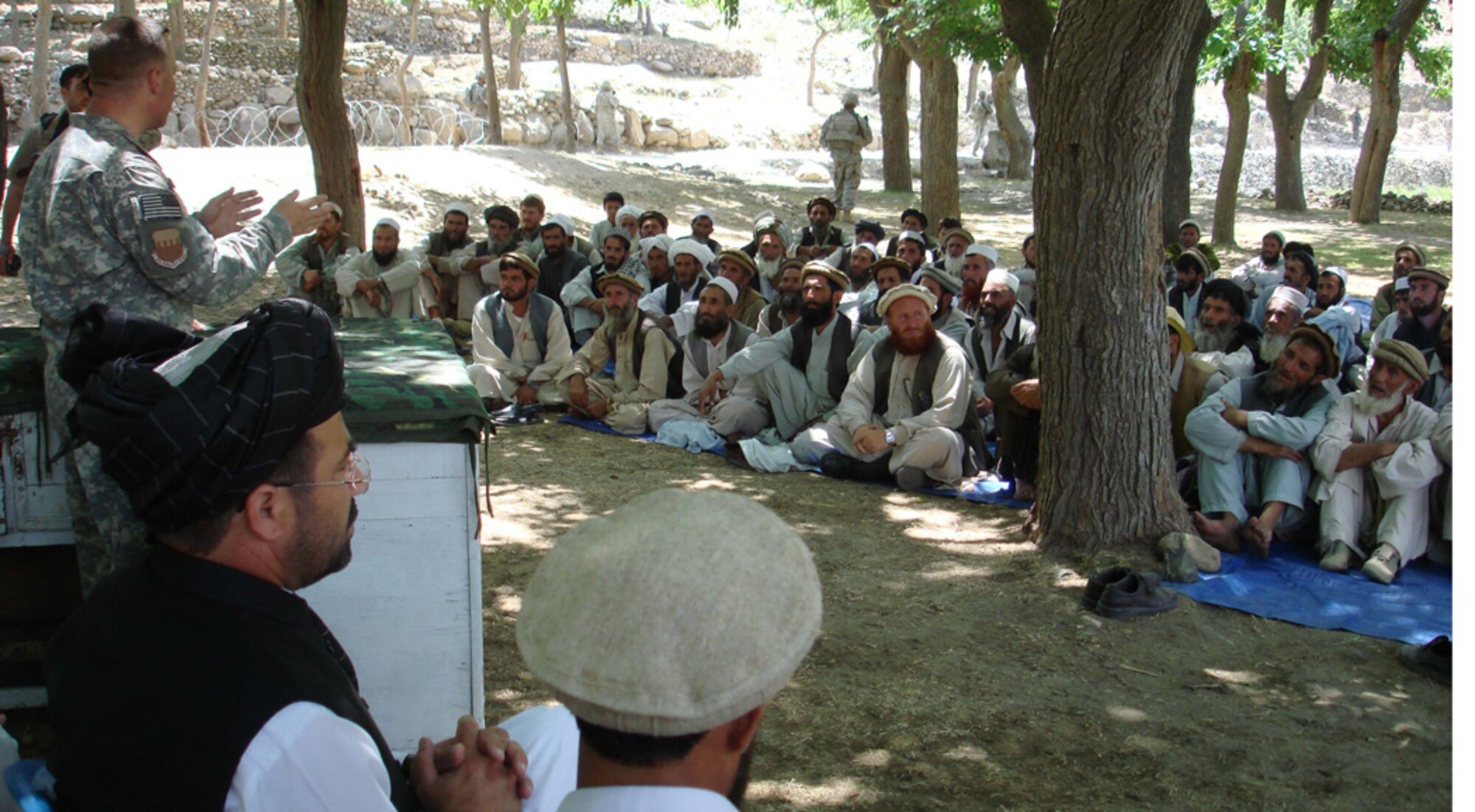 Lt. Col. Robert Ricci, 43rd Operations Support Squadron, speaks to a group of more than 200 elders at a shura as part of his duties leading the Mehtar Lam Provincal Reconstruction Team. 