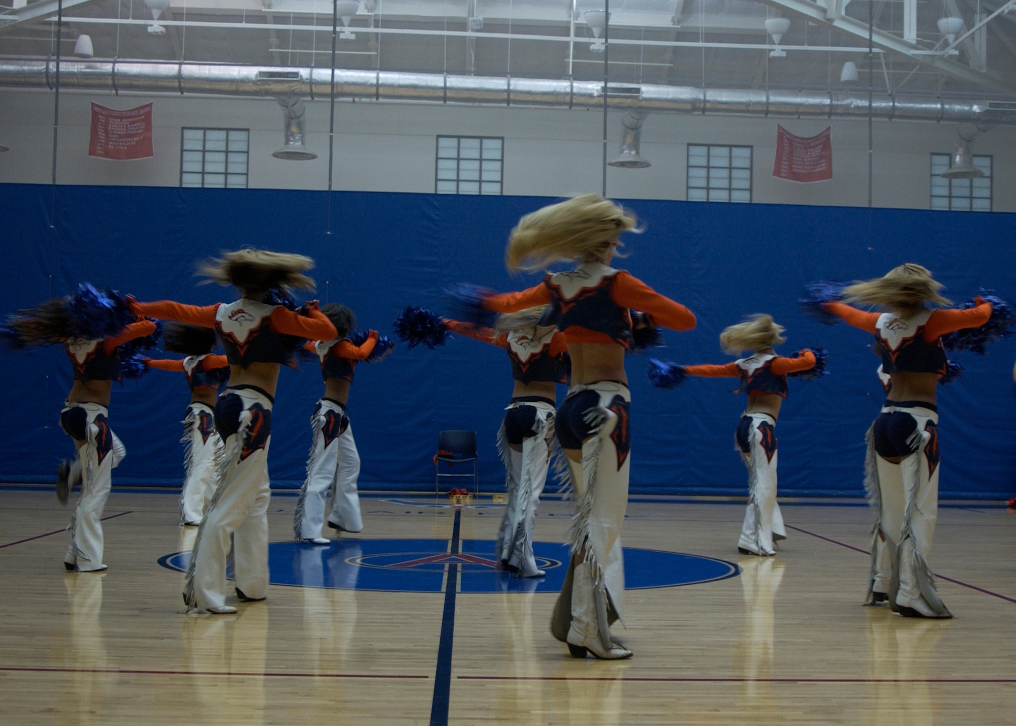 The Denver Bronco's Cheerleading Squad performed for members of Team Andersen on Jan. 25 at the Coral Reef Fitness and Sports Center. (U.S. Air Force photo/Airman 1st Class Zachary Hunter)