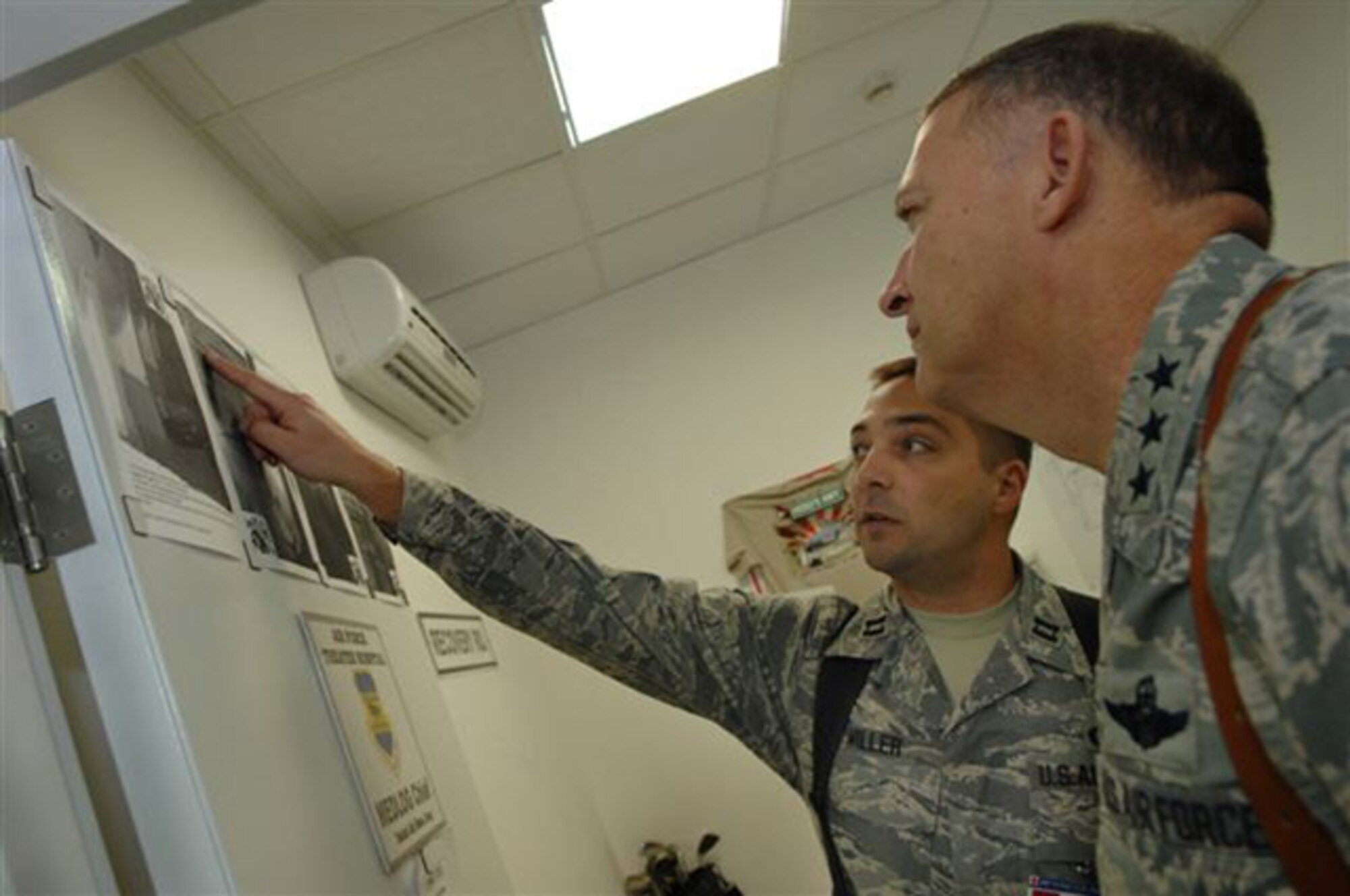 Capt. Scott Miller gives Lt. Gen. Gary North a tour of the Air Force Theater Hospital at Balad Air Base, Iraq, Jan. 26.  General North is 9th Air Force and U.S. Central Command Air Forces commander.  Captain Miller is the 332nd Medical Support Squadron commander.  (U.S. Air Force photo/Senior Airman Juliann Showalter)