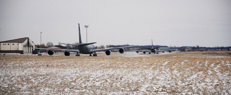 NIAGARA FALLS ARS, N.Y. -- A KC-135 aerial-refueling tanker departs from Niagara Falls Air Reserve Station for the last time Jan. 23. The New York Air National Guard's 107th will change its mission and its aircraft this spring. This is the first of the unit's aircraft to depart following reassignment. The 107th will work alongside the Air Force Reserve's 914th Airlift Wing as part of the Air Force Reserve's "Associate" concept.  In an associate base units will share people, resources and processes to accomplish their flying missions. "Team Niagara" will feature the 914th as host to the 107th this year with both units flying reserve C-130H2s.  (U.S. Air Force photo/Staff Sgt. Dan Lanphear)