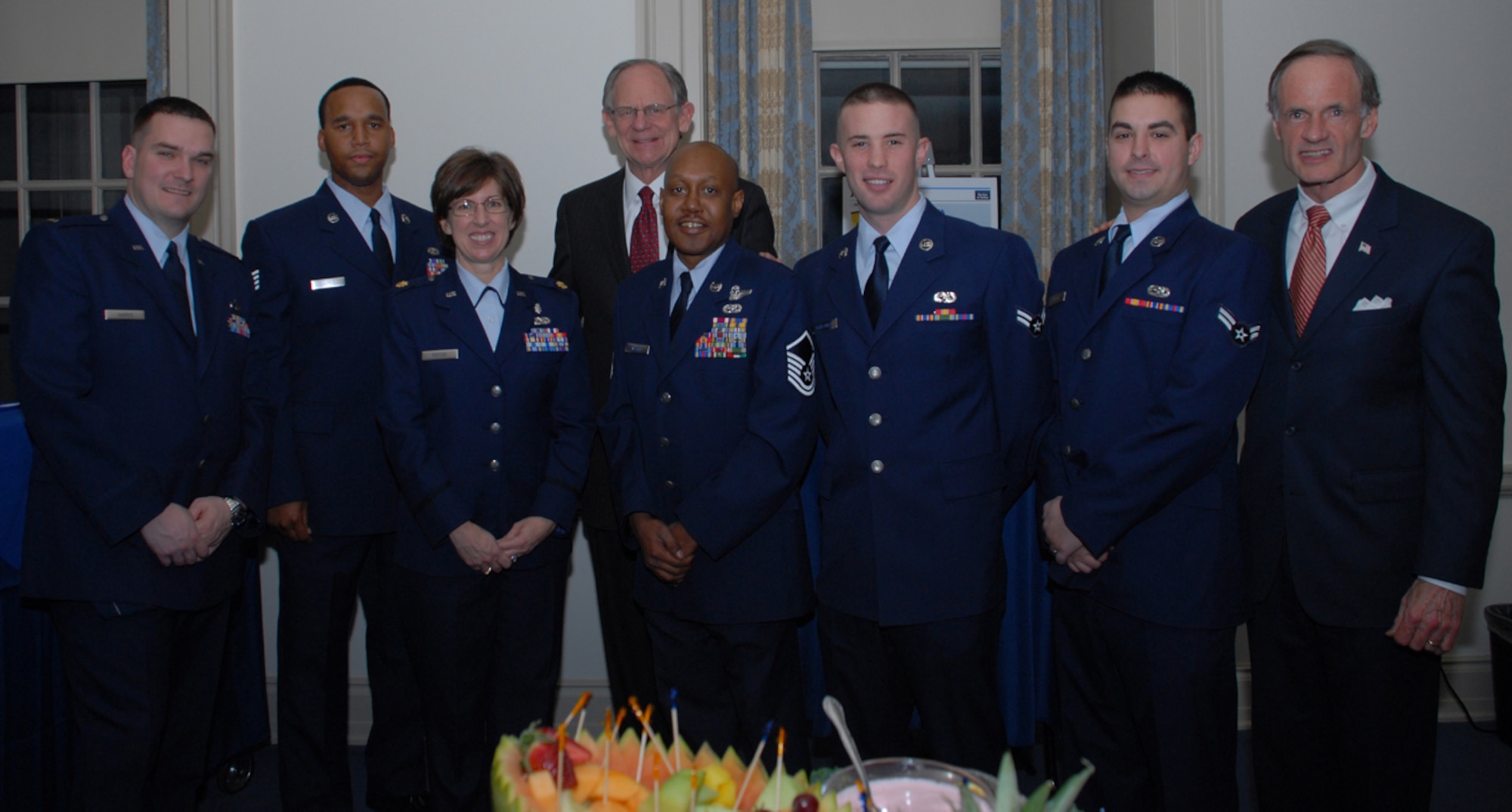 2nd Lt. James Harris, 436th Maintenance Group, Staff Sgt. Huey Harris, 436th Services Squadron, Maj. Marcia Potter, 436th Medical Operations Squadron, Rep. Mike Castle, Delaware, Master Sgt. Dexter Joseph, 9th Airlift Squadron, Airman 1st Class Jacob Schlemmer, 436th Aircraft Maintenance Squadron, Airman 1st Class Christopher Dellis, 436th AMXS, and U.S. Sen. Tom Carper of Delaware, met at an 'Ice Breaker' held in the honor of the Air Force Commander In Chief's Installation Excellence team at the Delaware Public Archives Jan. 27. Airmen of all ranks, who were selected to represent their units and brief the CINC IE team, met with the team and Delaware congressional leadership at the ice breaker. (U.S. Air Force photo/Tech. Sgt. Kevin Wallace)