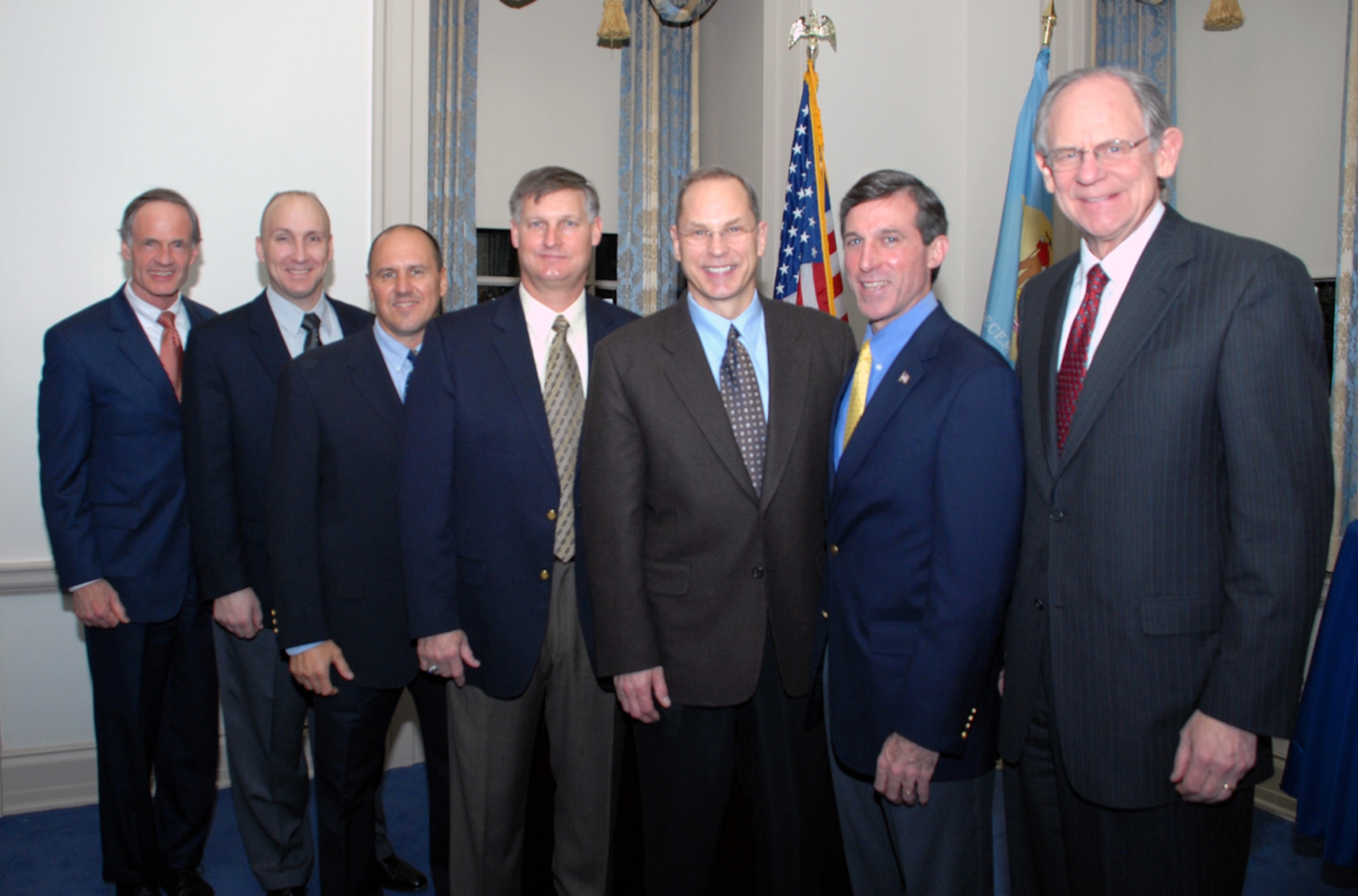 U.S. Sen. Tom Carper, Col. David Allvin, Col. Randall Falcon, Col. Michael Bartley, Maj. Gen. Mark Anderson, Lt. Gov. John Carney, Jr., and Rep. Mike Castle, were among the many guests who attended the Air Force Commander In Chief's Installation Excellence team's 'Ice Breaker' at the Delaware Public Archives Jan. 27. The entire Delaware congressional staff was present to welcome the CINC IE team to Dover, where they will inspect more than 125 workcenters in less than two days. (U.S. Air Force photo/Tech. Sgt. Kevin Wallace)