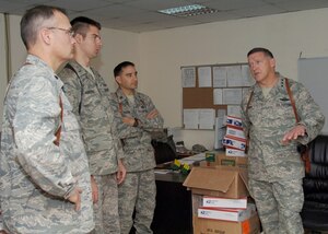 BALAD AIR BASE, Iraq -- Lt. Gen Gary North, 9th Air Force and U.S. Central Command Air Forces commander, meets with Lt. Col. Gary Schneider, 1st Lt. Adam Strecker and Maj. Walter Yazzie from the 732nd Expeditionary Civil Engineer Squadron here Jan. 26. The general toured many Balad facilities and talked with many Airmen and Soldiers Jan. 26-27.  (U.S. Air Force photo/ Tech. Sgt. Heather Cabral) 