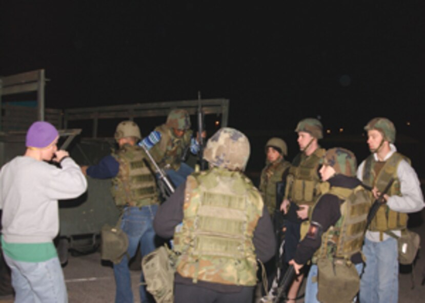Airmen from the 39th Security Forces Squadron load a truck for transport to their assigned locations during a 30-30 (no-notice recall exercise) Jan. 22 at Incirlik. (Photo by Tech. Sgt. Patrick Hyde).