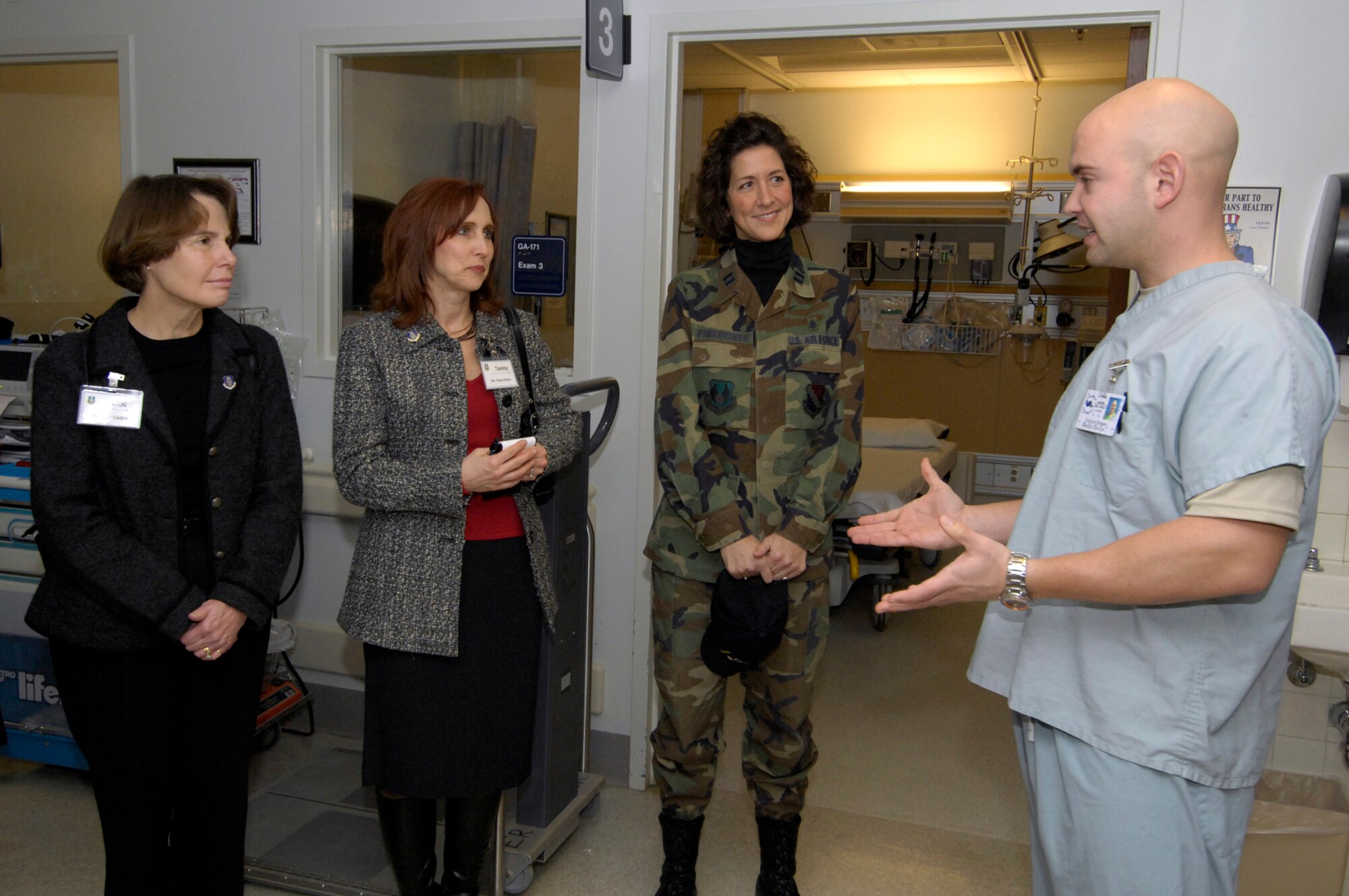 Vicky Carlson, far left, Tammy Dennis and Capt. Courtney Finkbeiner, 66th Medical Operations Squadron Health Care integrator and deputy chief nurse, listen as Tech. Sgt. Derrick Brewer, 66 MDG Education and Training noncommissioned officer in charge, describes some of the skills the 66th Medical Group nurses and medical technicians cultivate while working at the Veterans Affairs Boston Health Care System in West Roxbury, Mass.  Mrs. Carlson and members of the Hanscom Spouses Club toured the hospital Jan. 28 as part of Mrs. Carlson’s official visit to Hanscom with her husband, Gen. Bruce Carlson, Air Force Materiel Command commander.

